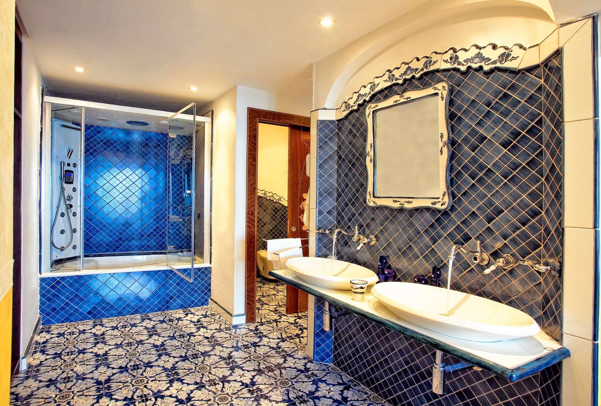 STRAND HOTEL DELFINI-guestroom-GUEST BATHROOM.jpg