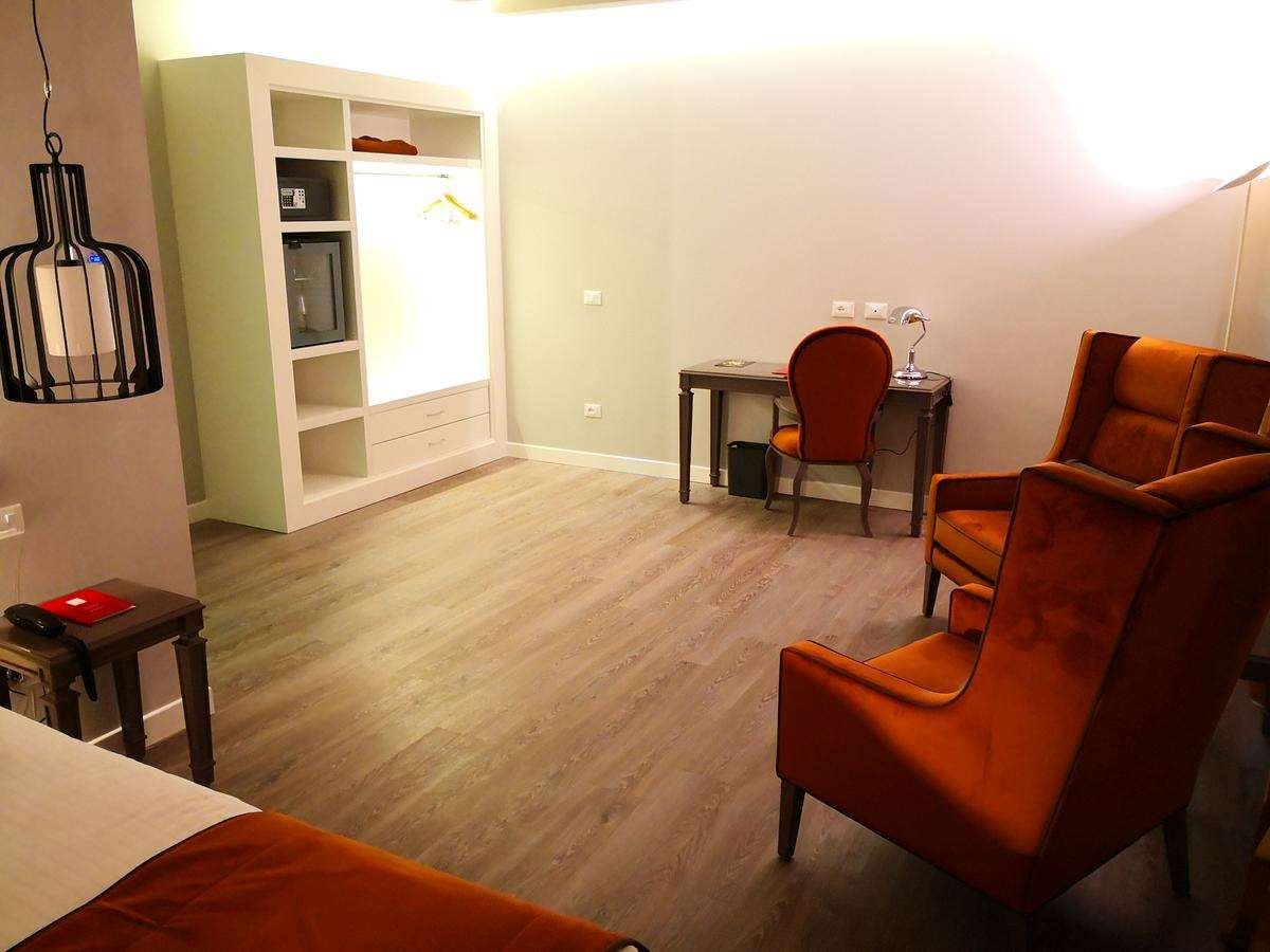HOTEL CAMPO MARZIO-guestroom-GUEST ROOM LIVING AREA.jpg