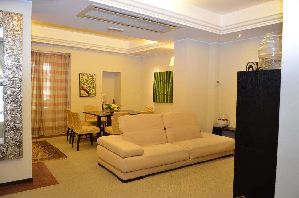 HOTEL CASSISI - MILAZZO-guestroom-GUEST ROOM LIVING AREA.jpg