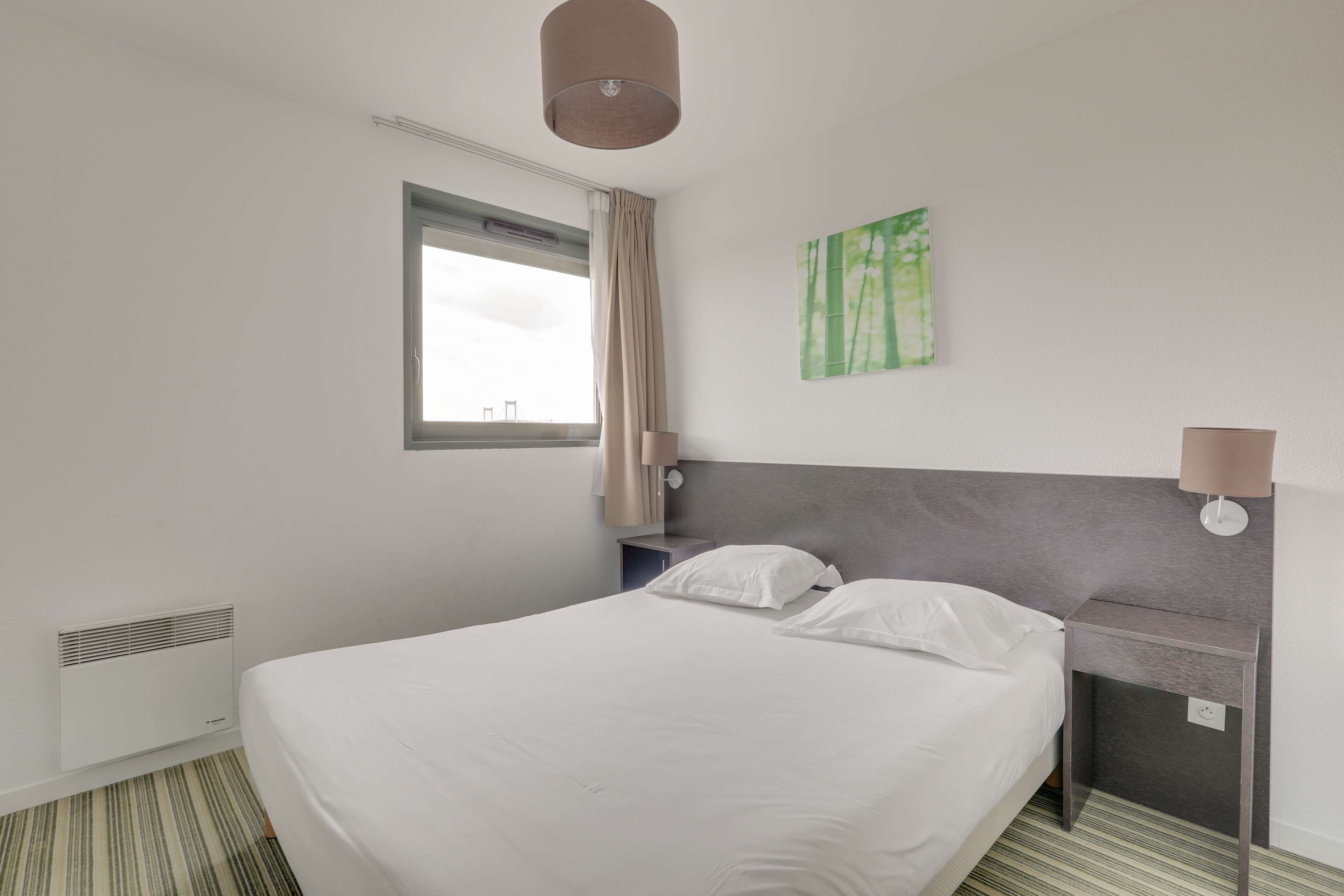 ALL SUITES APPART HOTEL BORDEAUX LA-guestroom-APARTMENT DOUBLE BED AND SOFA BED.jpg