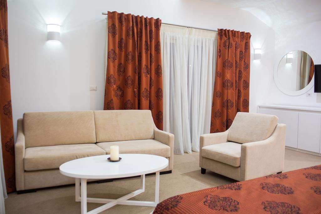 SANTA QUARANTA HOTEL-guestroom-GUEST ROOM LIVING AREA.jpg