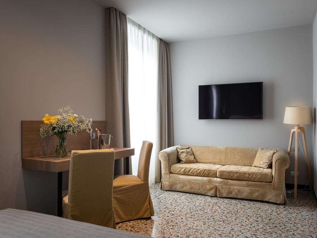 HNN LUXURY SUITES-guestroom-GUEST ROOM LIVING AREA.jpg
