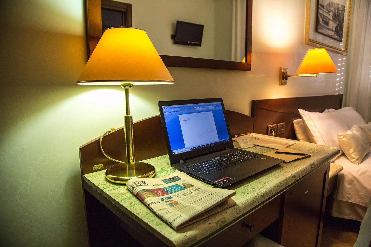 HOTEL PALMED - GIZZERIA LIDO-guestroom-GUEST ROOM WORK DESK.jpg