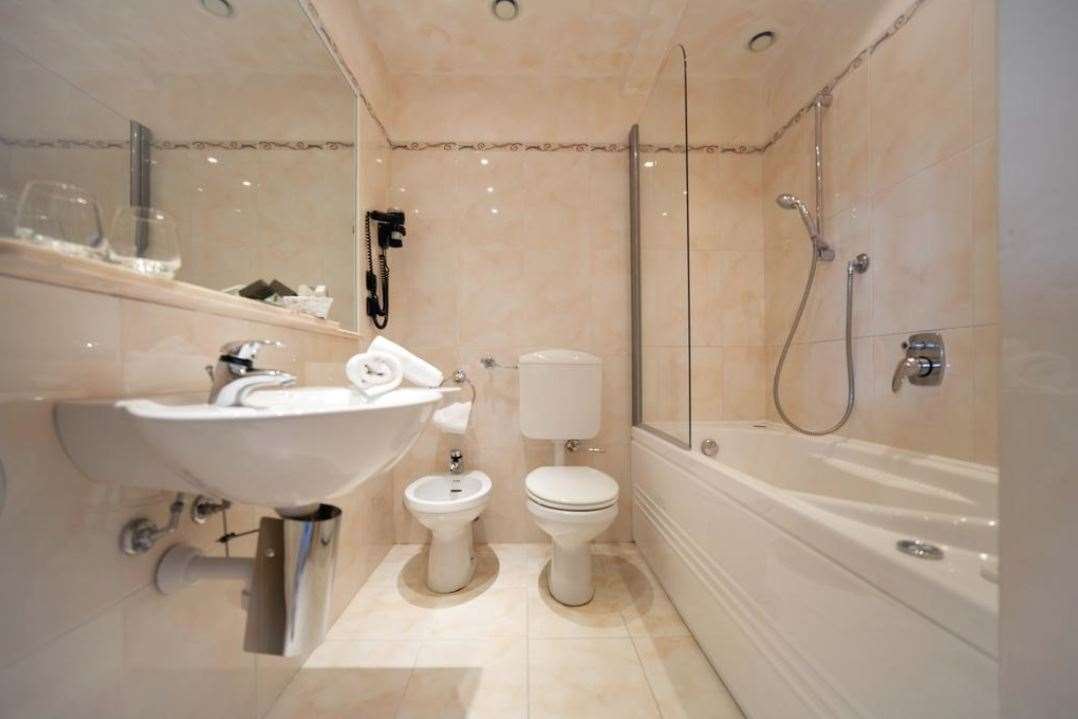 NYALA SUITES SANREMO-guestroom-GUEST BATHROOM.jpg