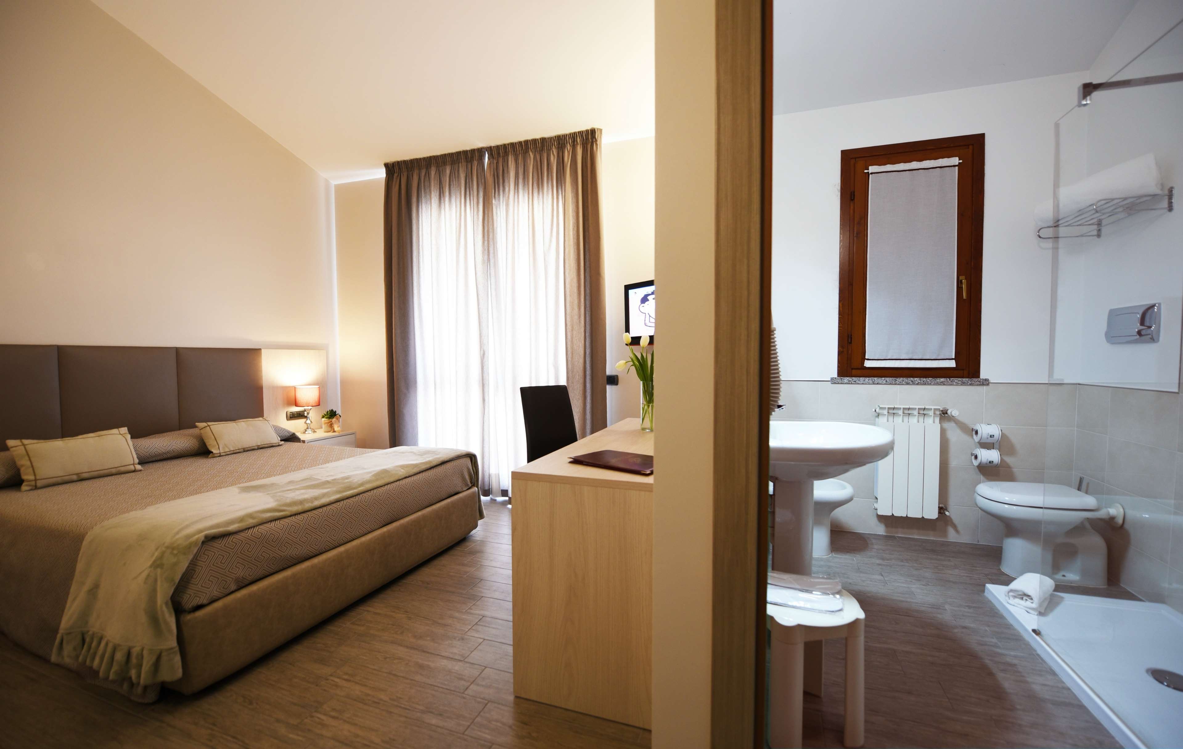 HOTEL ULIVI - PARATICO-guestroom-GUEST ROOM.jpg