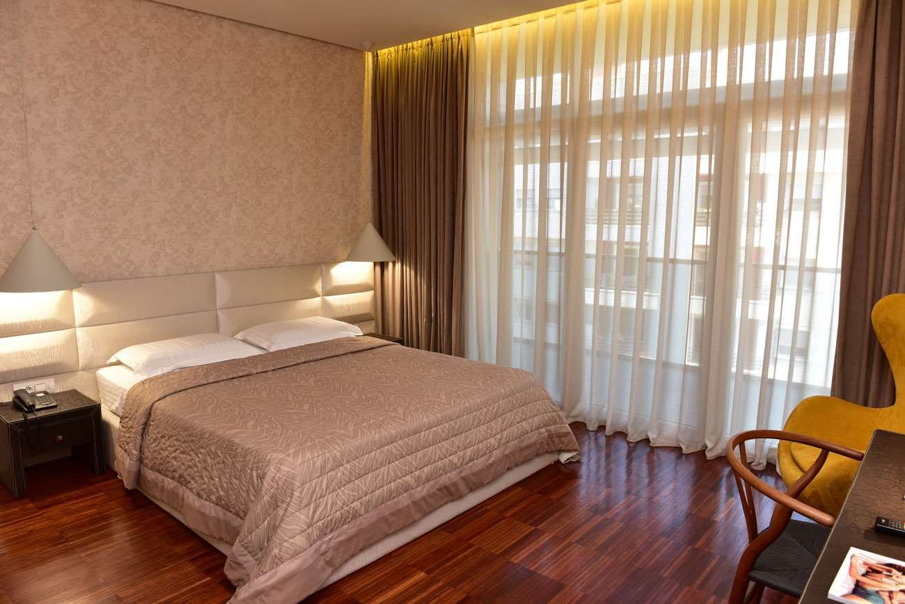 LA BOHEME HOTEL-guestroom-GUEST DELUXE ROOM WITH BALCONY.jpg
