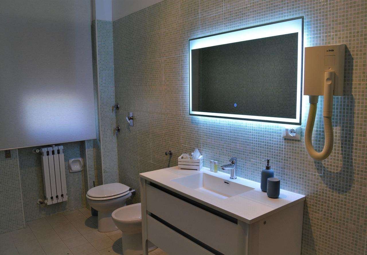 TURSPORT HOTEL AND RESIDENCE-guestroom-GUEST BATHROOM.jpg