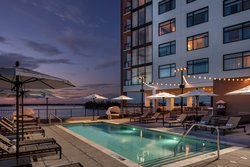  - Luminary Hotel & Company