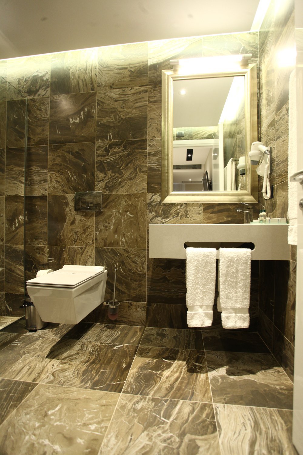 SENATOR HOTEL TIRANA-guestroom-GUEST BATHROOM.jpg