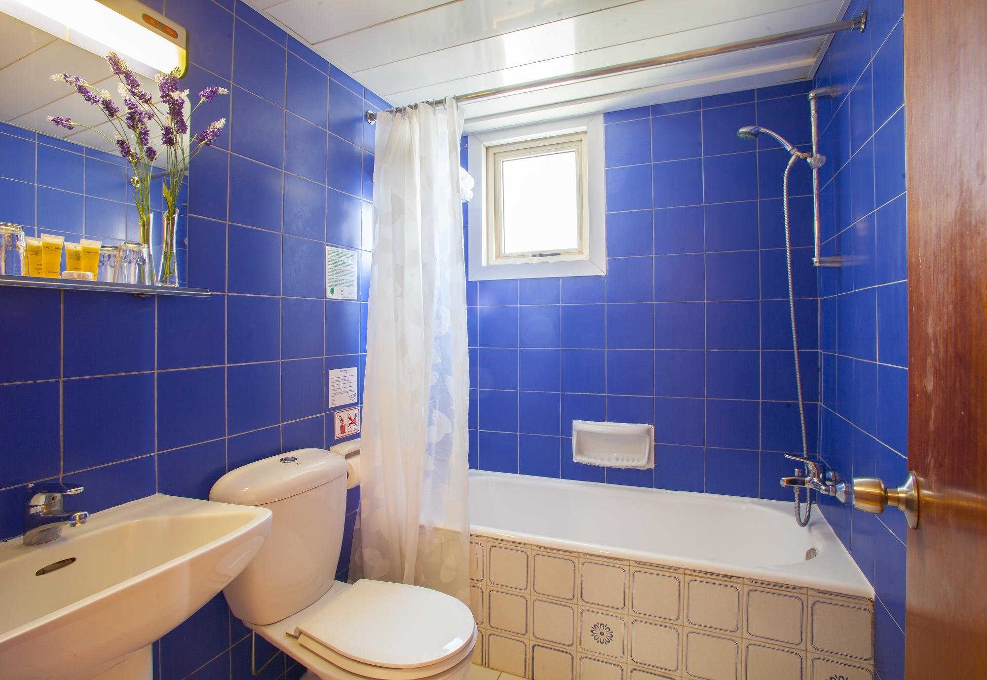 KAPETANIOS LIMASSOL HOTEL-guestroom-GUEST BATHROOM.jpg