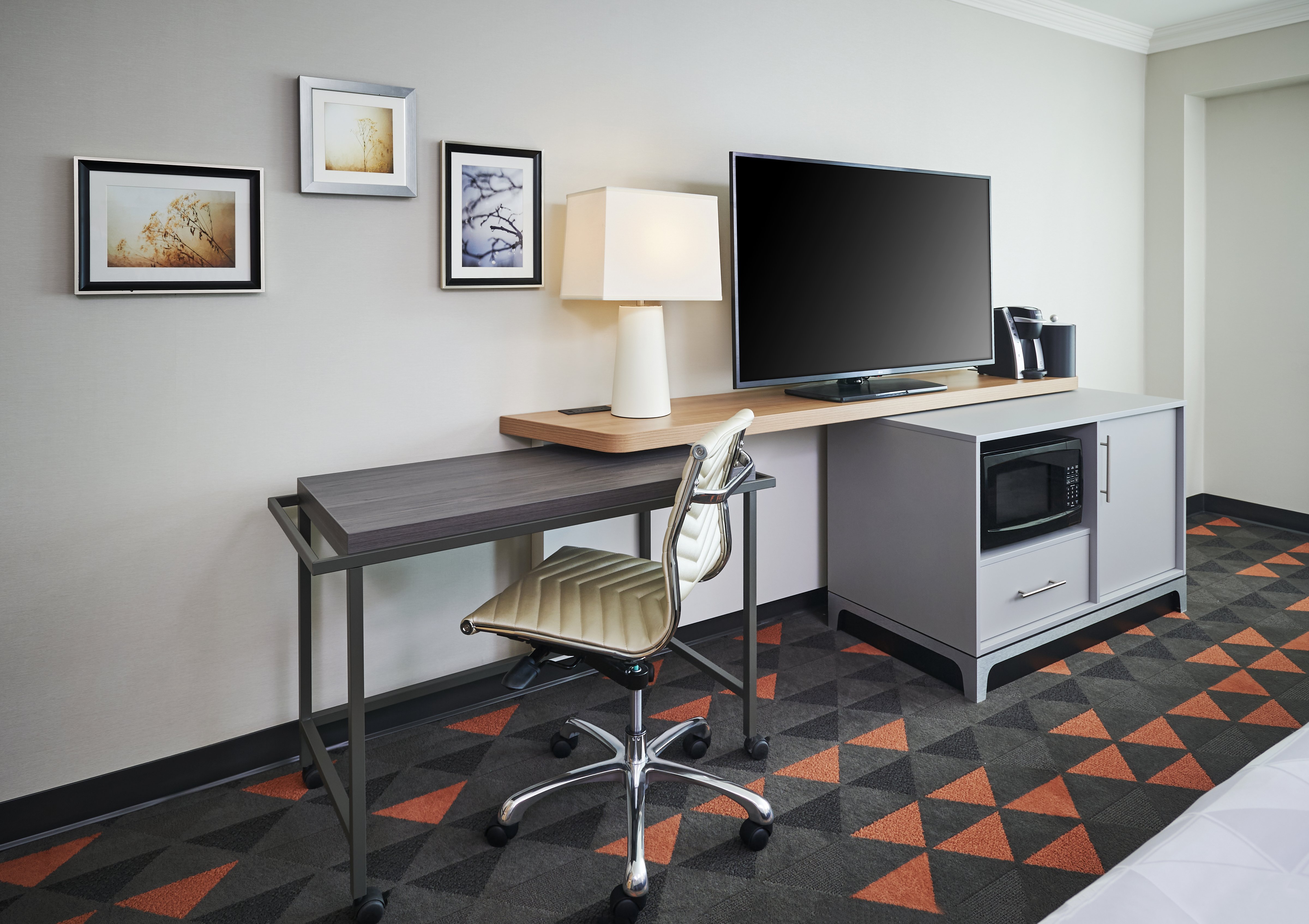 Work zone with rolling desk and ergonomic chair