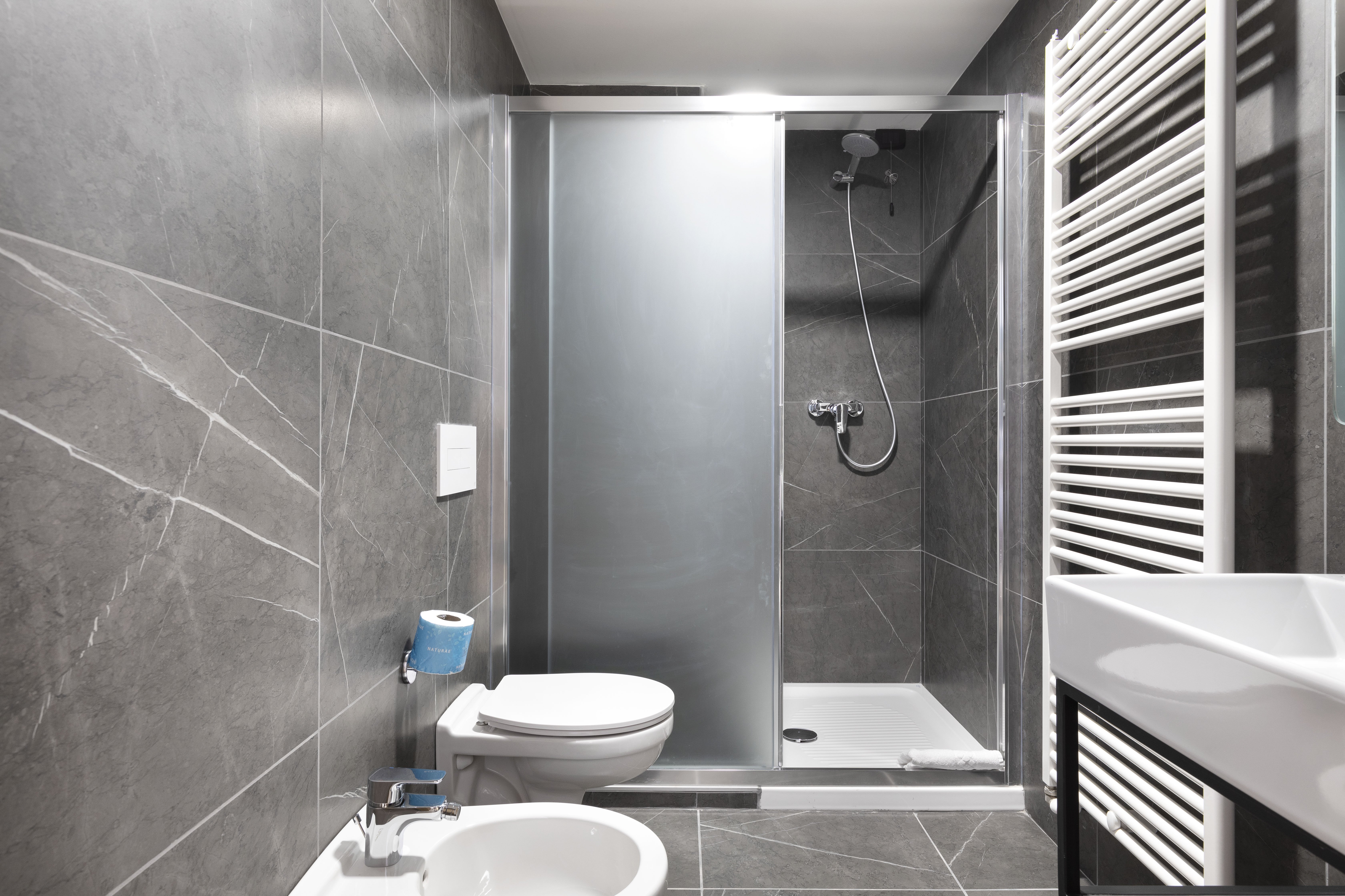 B&B HOTEL CORTINA PASSO TRE CROCI-guestroom-GUEST BATHROOM.jpg