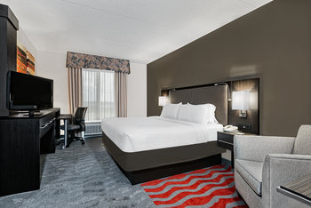Spacious room matched with comfortable beds and pillows.
