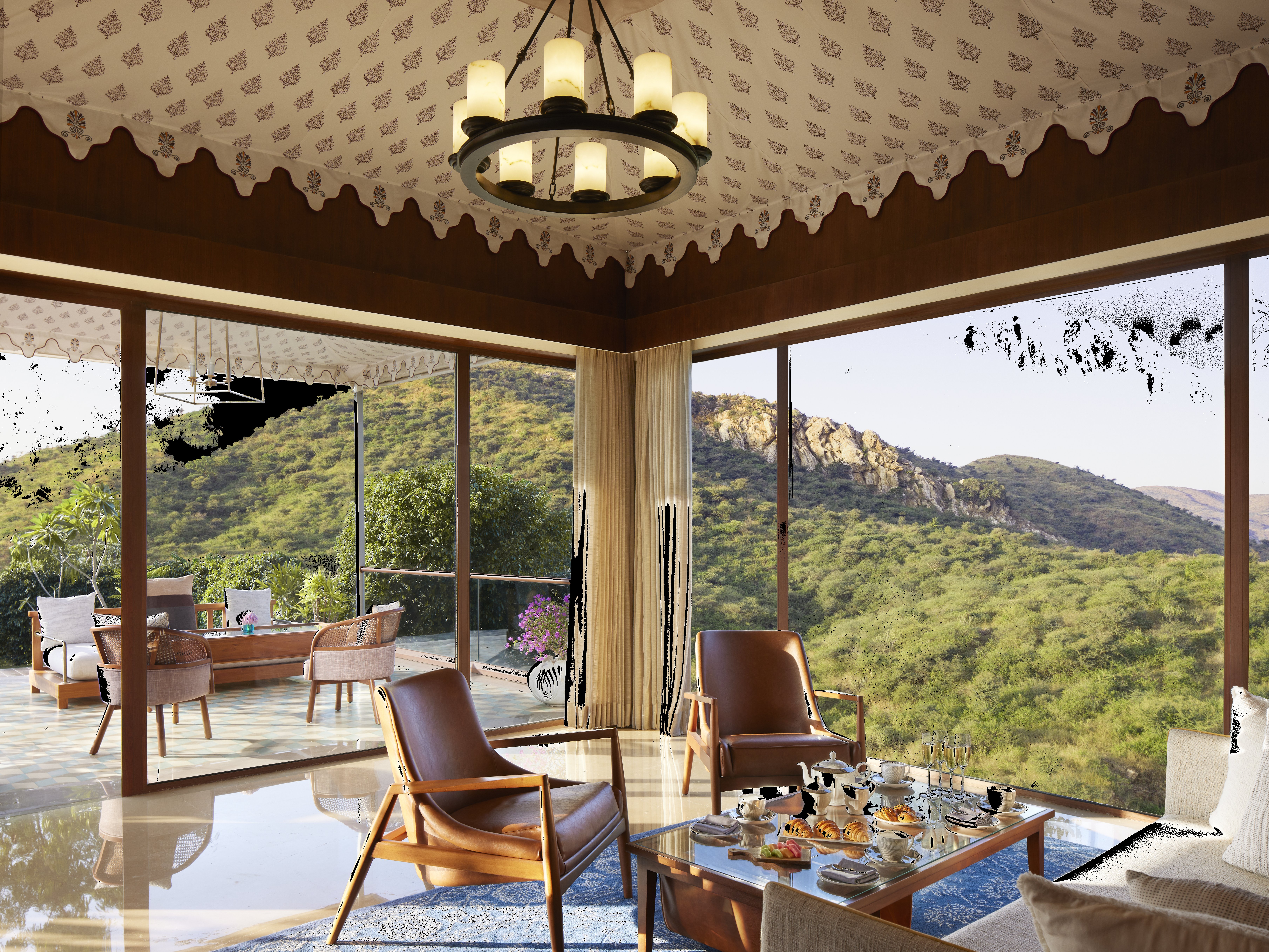 Taj Aravali Resort and Spa-guestroom-Glass Box Suite Living Room.jpg