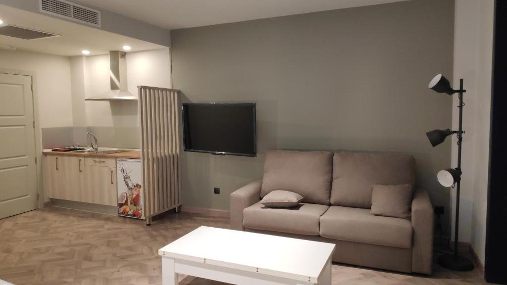 APARTAMENTOS CIDADE VELLA-guestroom-GIEST ROOM LIVING AREA.jpg