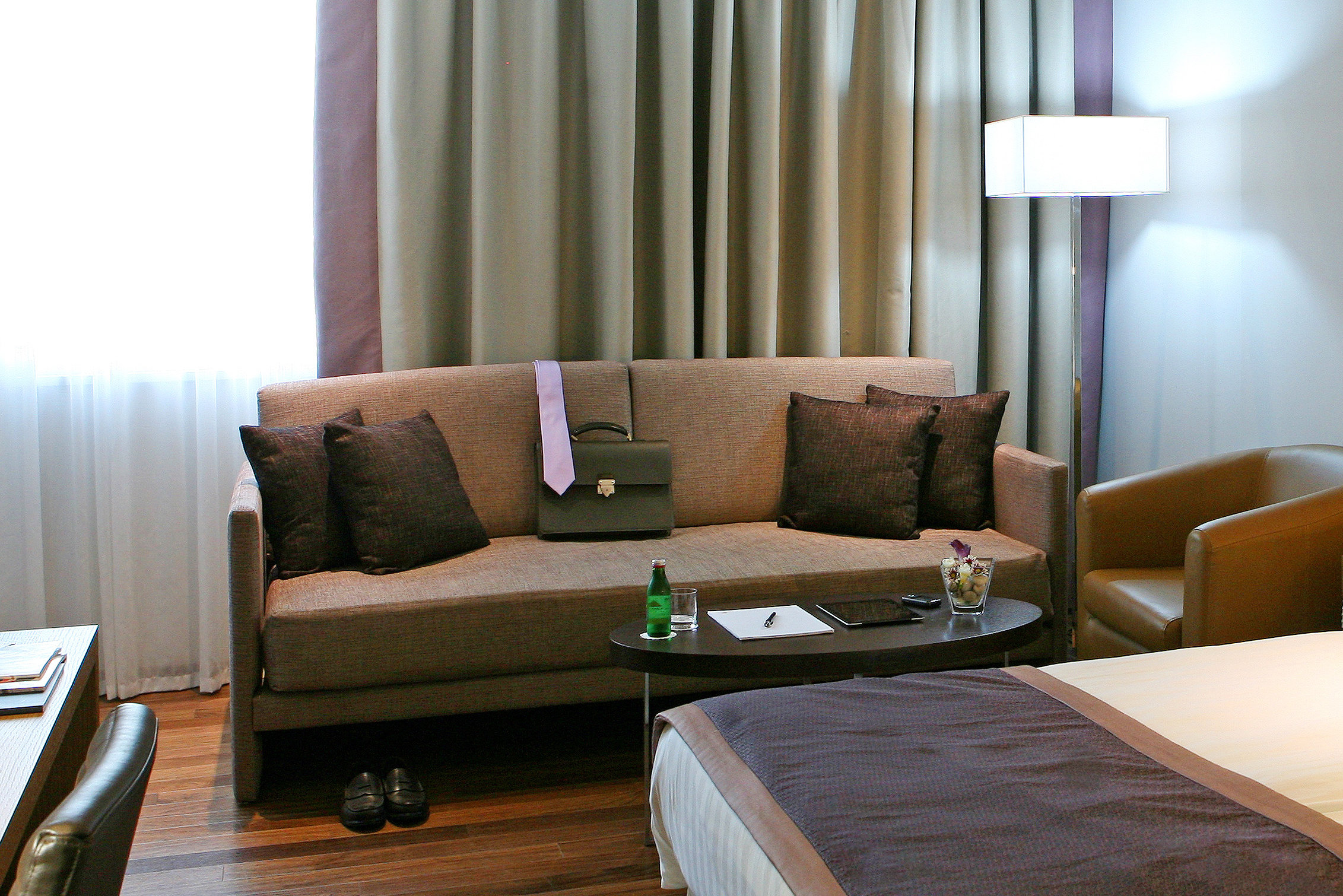 CROWNE PLAZA LIMASSOL BY IHG-guestroom-Comfortable couch corner or sofa bed when needed.jpg