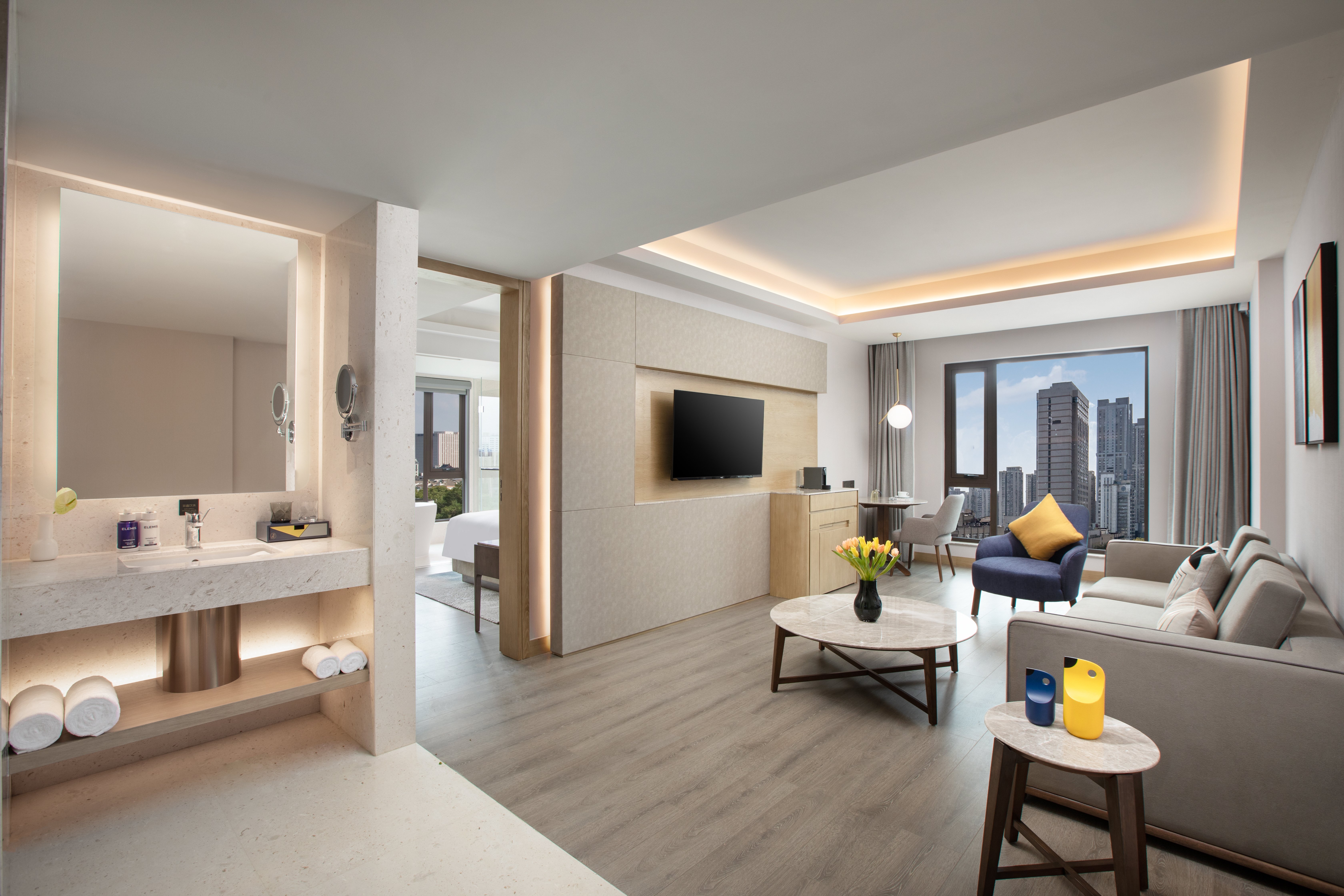 VOCO ORIENTAL PEARL BY IHG-guestroom-Living area.jpg