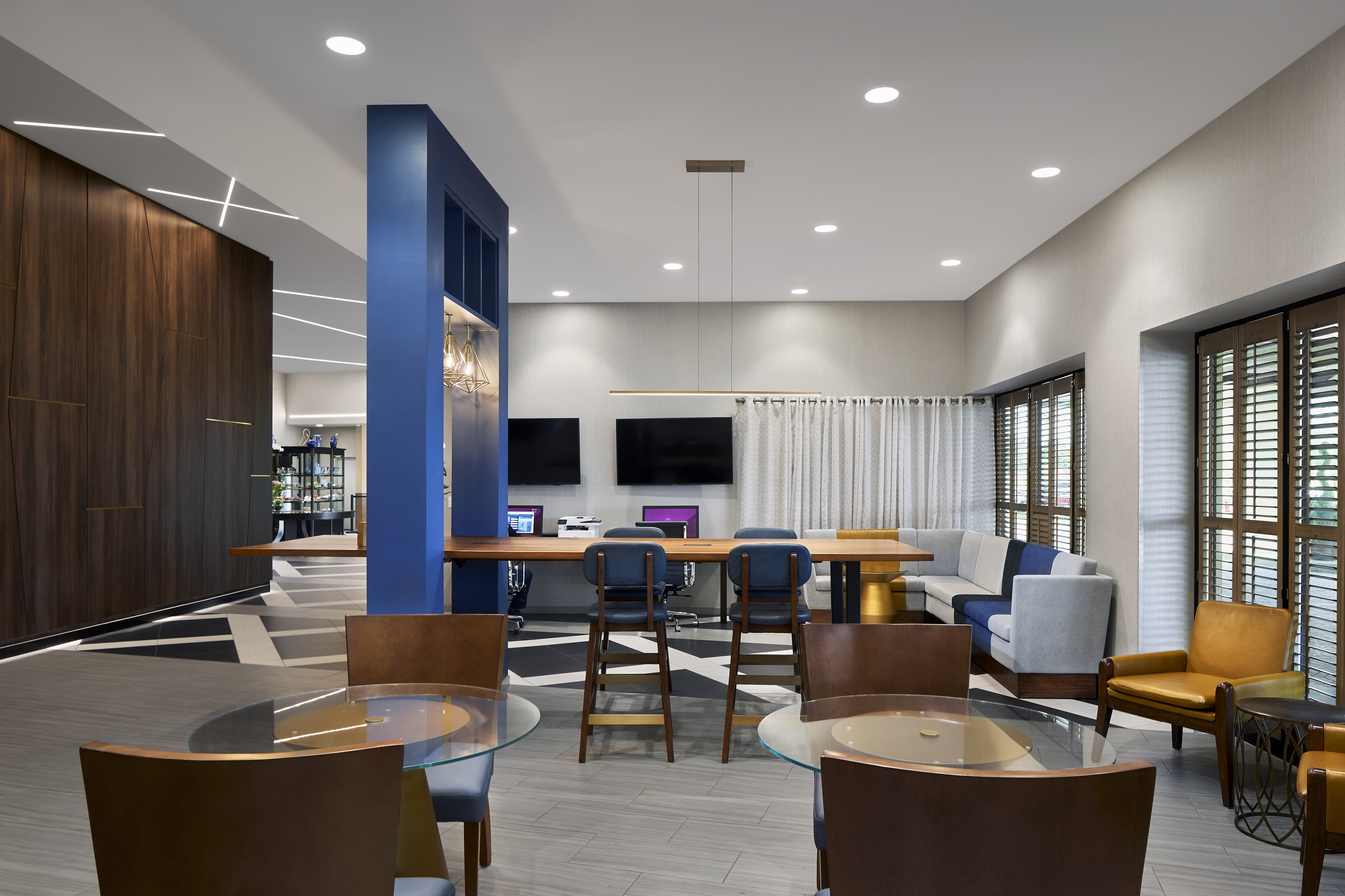 A stylish hotel lobby with modern amenities.