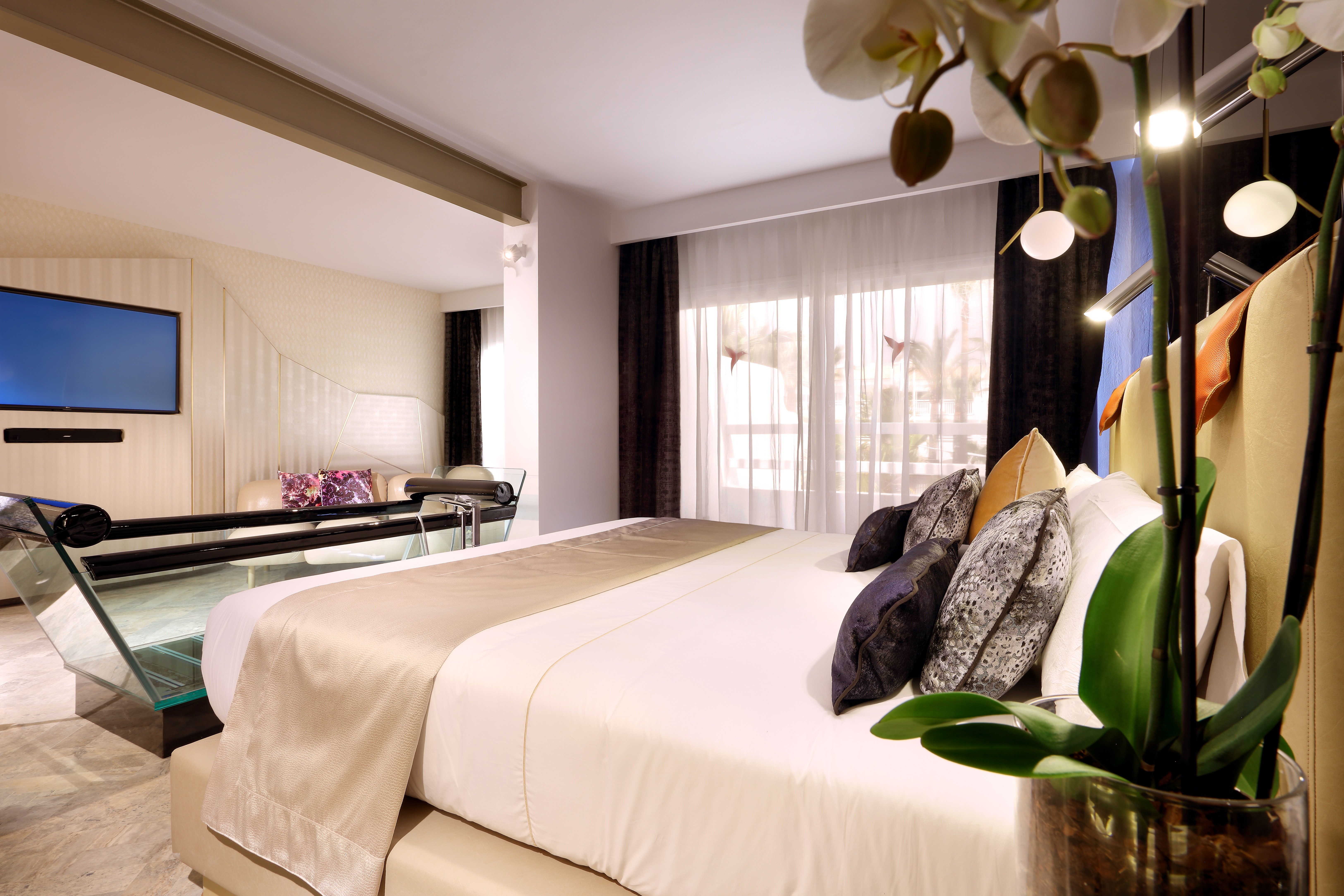 The Unexpected Ibiza Hotel-guestroom-Suite Club Bed.jpg