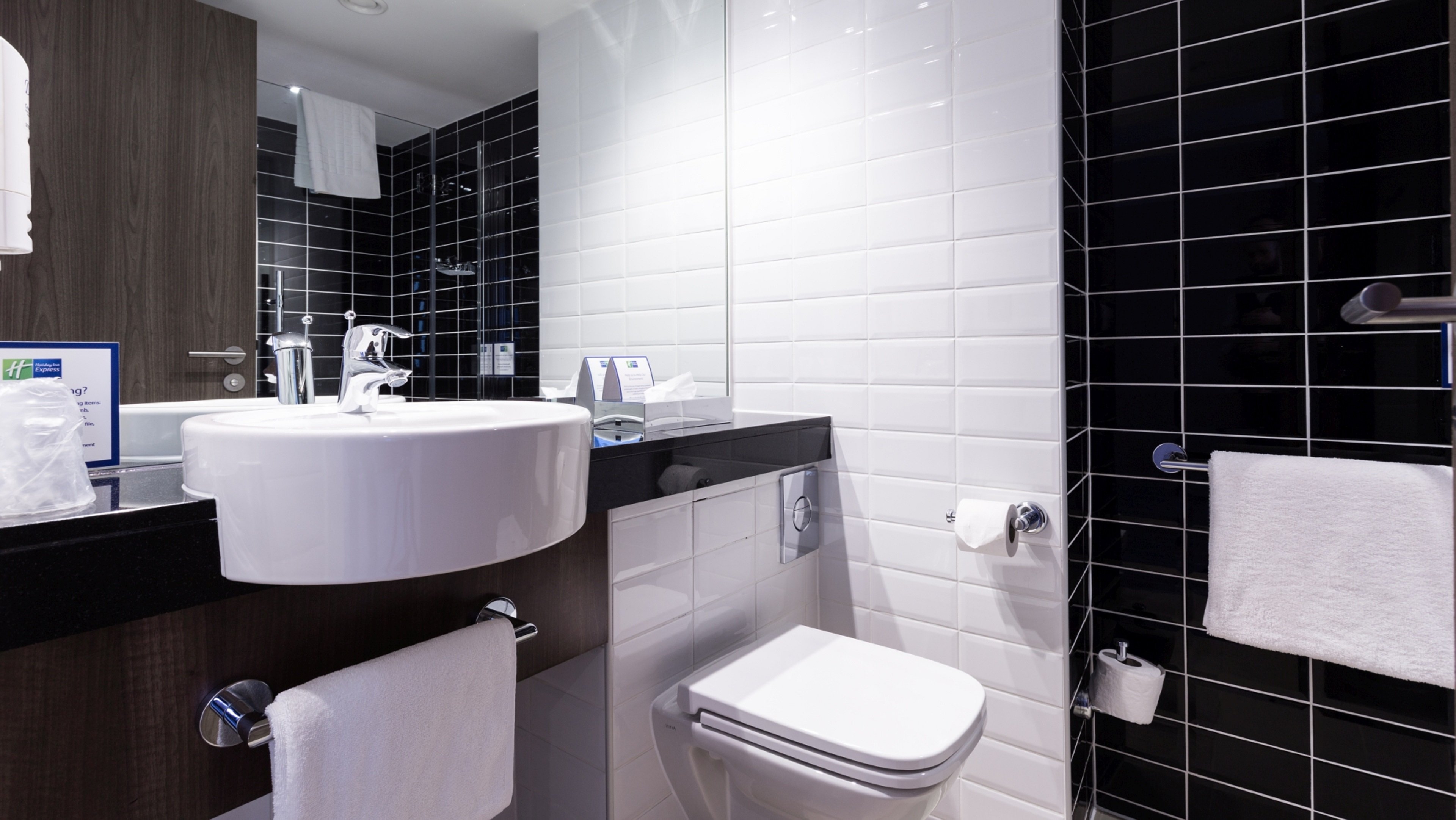 HOLIDAY INN EXP WAKEFIELD BY IHG-guestroom-Guest bathroom.jpg
