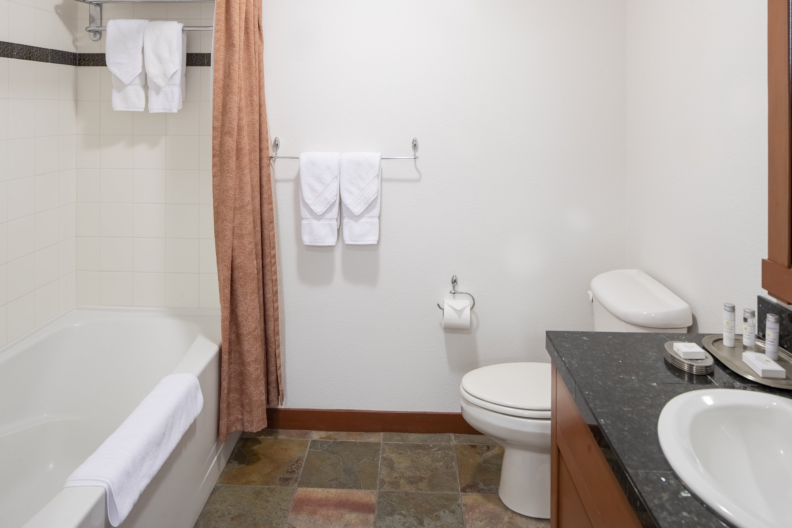 1 Bedroom bathroom with shower/tub combo