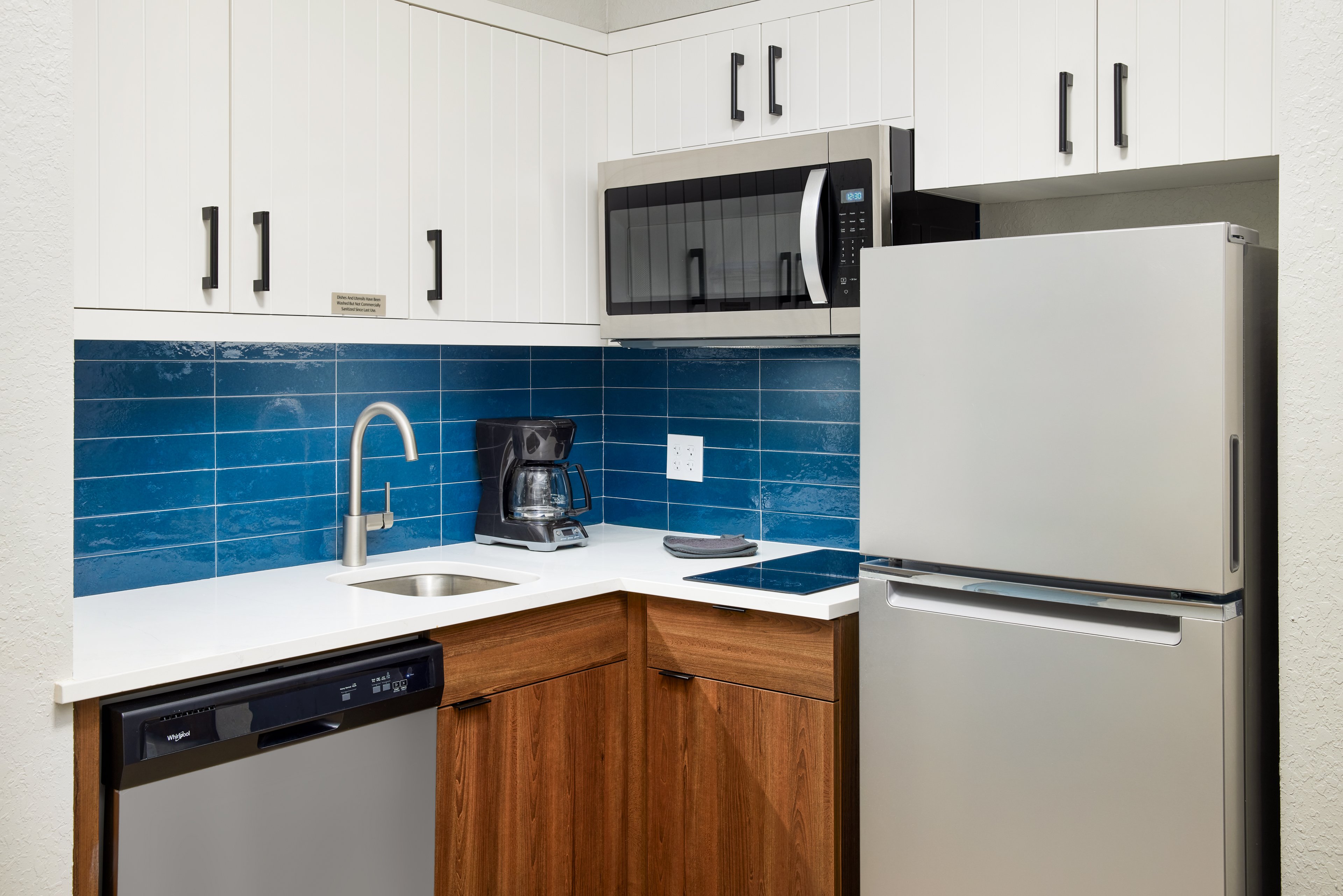 STAYBRIDGE STES AUBURN UNIV AREA BY-guestroom-Full kitchens in every guest suite.jpg