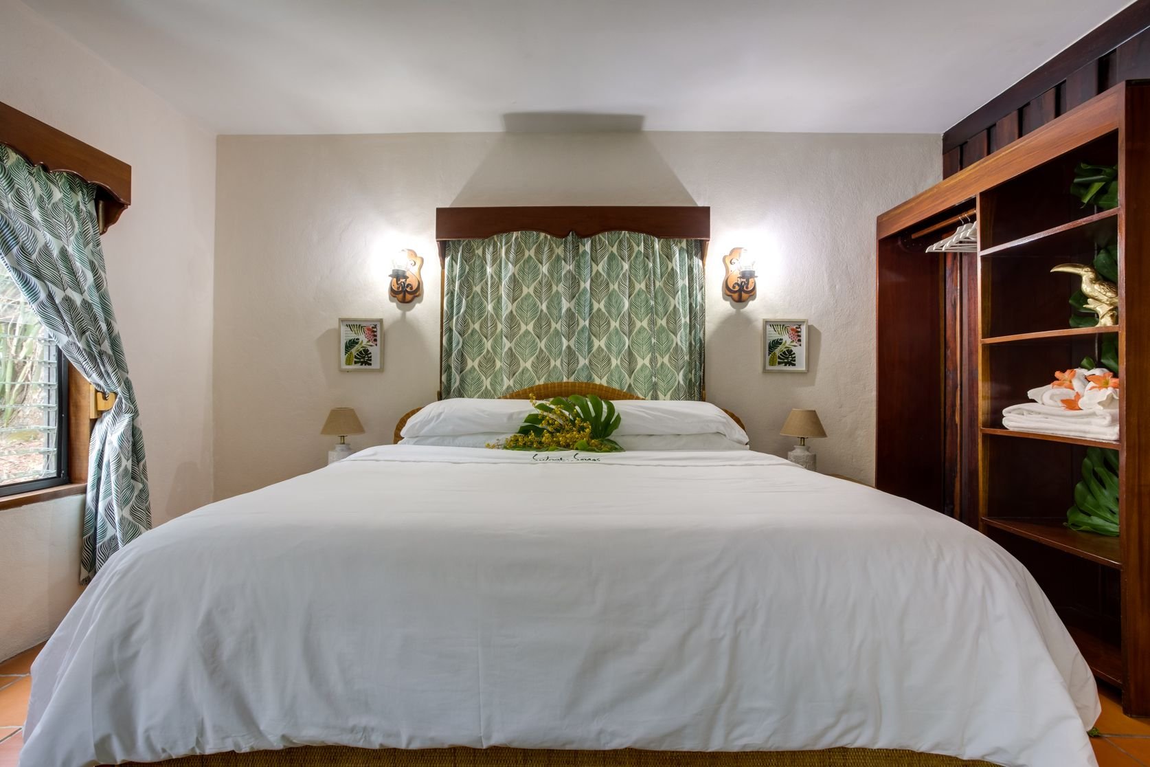 SWEET SONGS JUNGLE LODGE-guestroom-King Casita Bedding.jpg