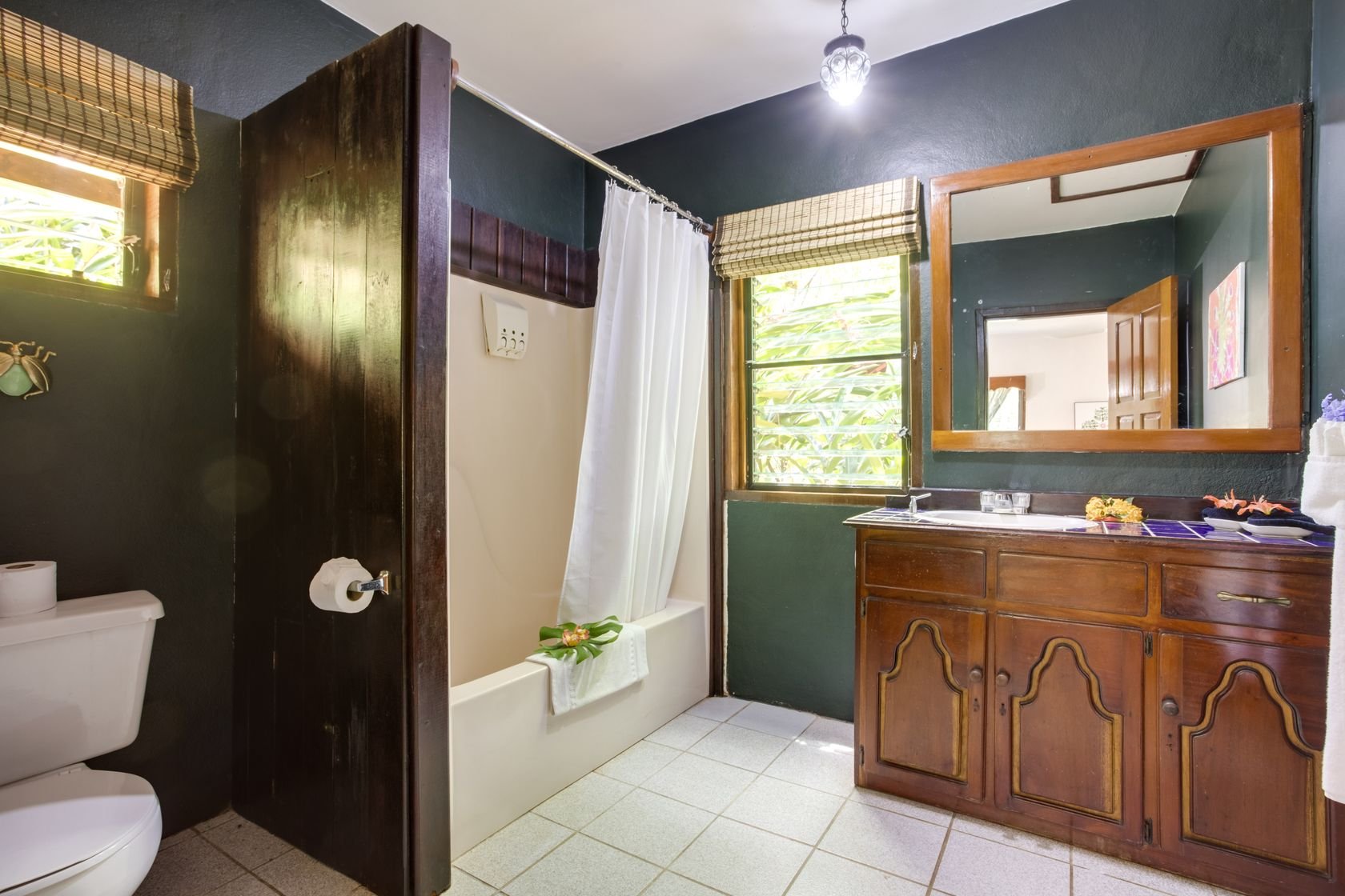 SWEET SONGS JUNGLE LODGE-guestroom-King Casita Bathroom.jpg