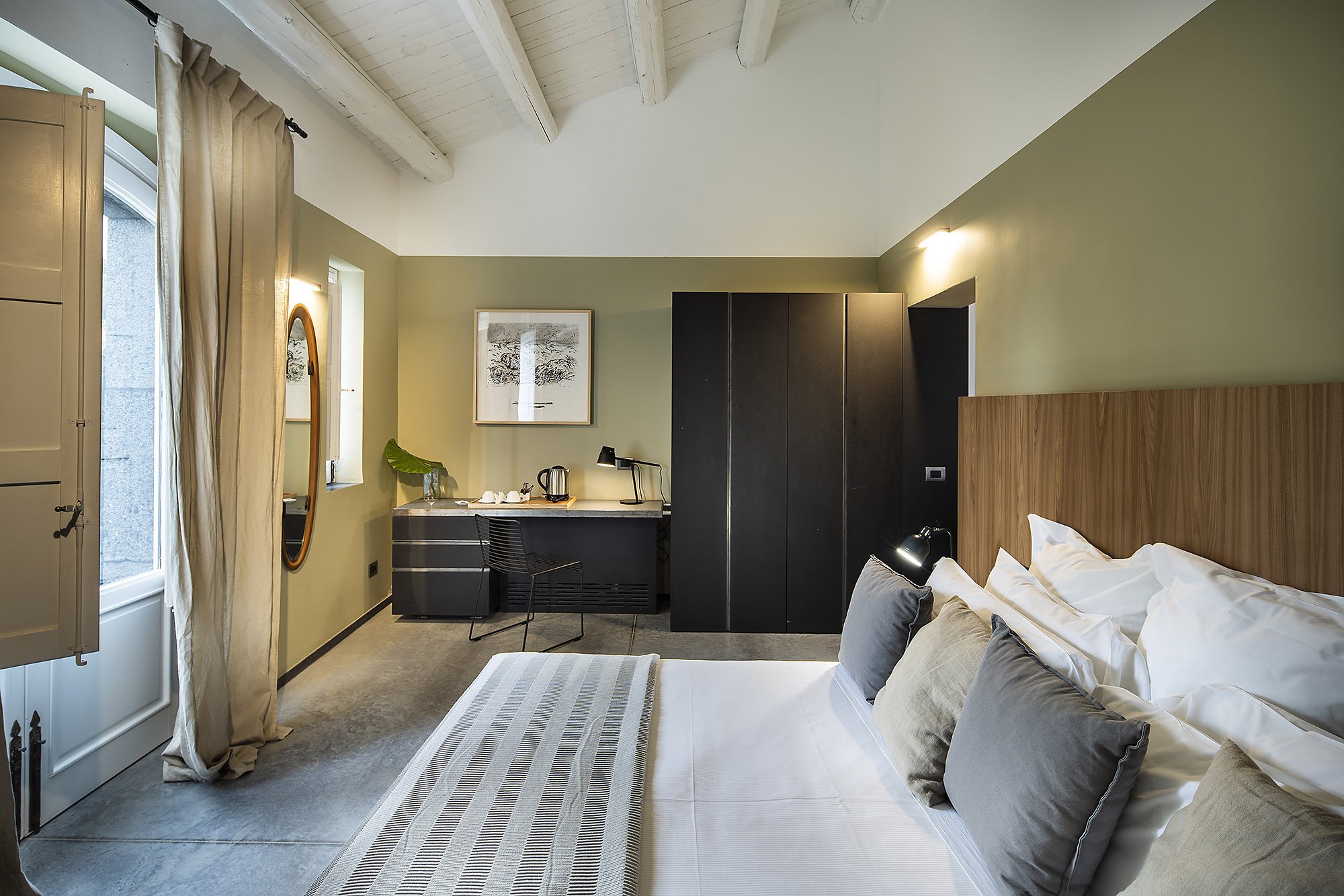 DONNA CARMELA RESORT AND LODGE-guestroom-De Luxe Suite.jpg