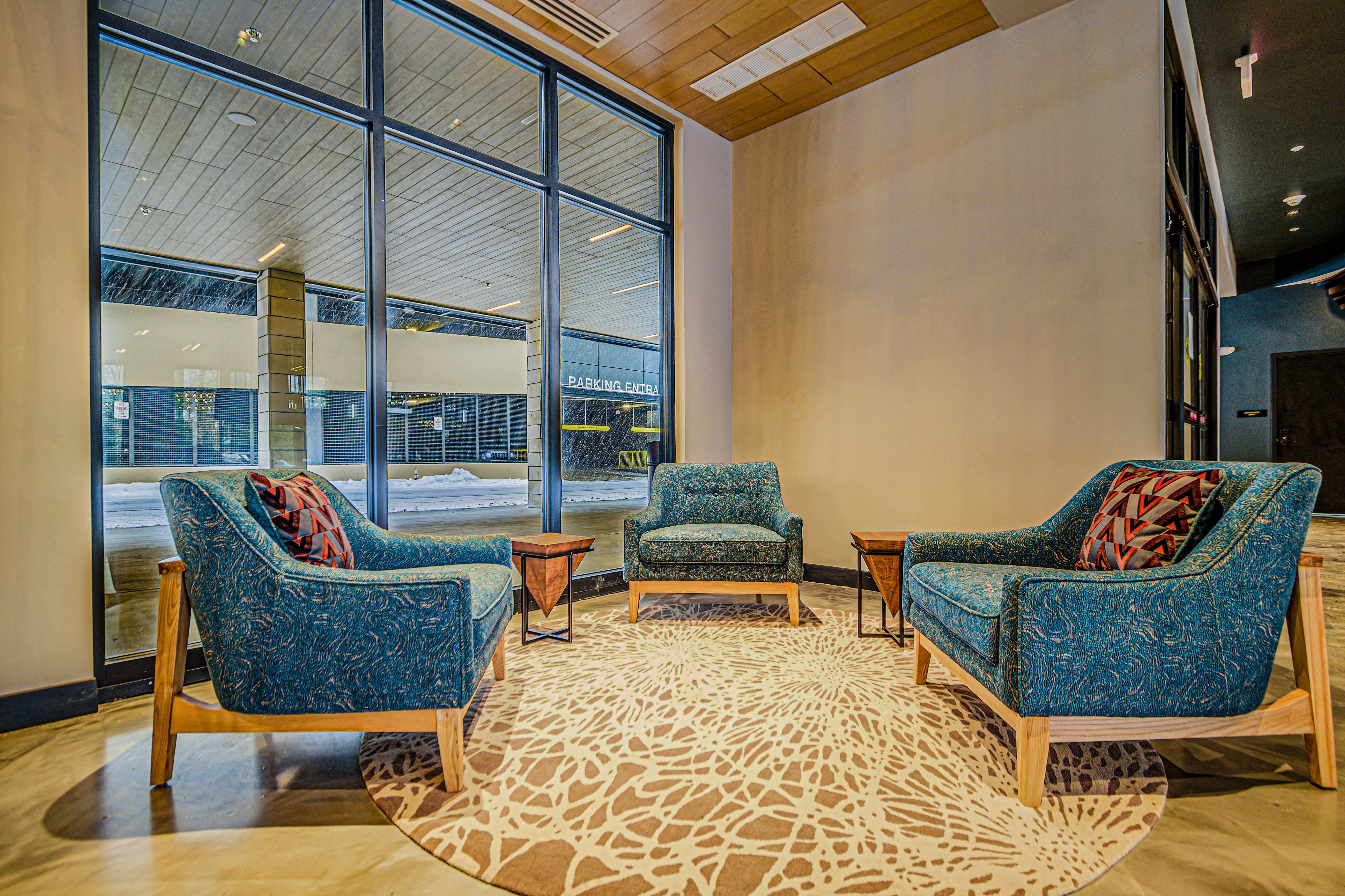 HOTEL INDIGO SILVERTHORNE BY IHG-guestroom-Gather in cozy sitting area after day of hiking or skiing.jpg