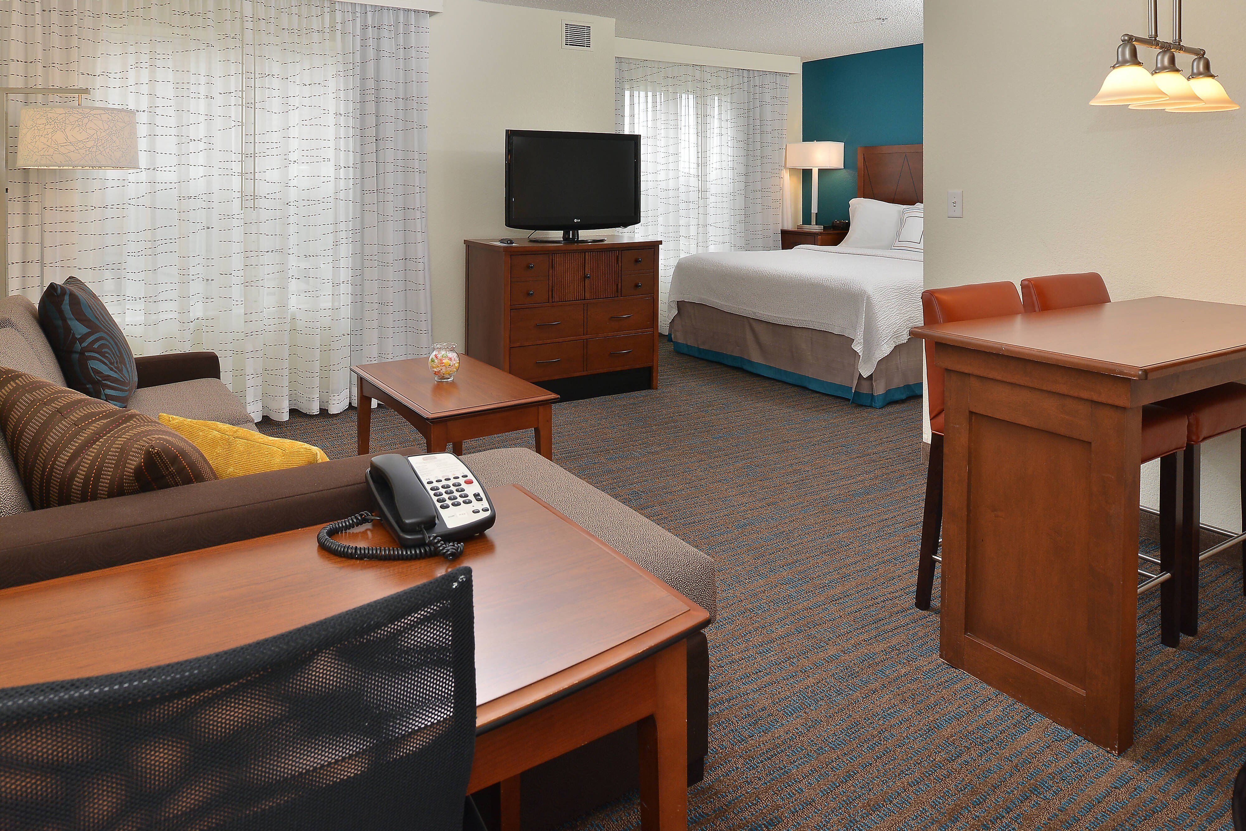 Residence Inn by Marriott Loveland Fort Collins-guestroom-King Studio Suite – Living Area.jpg