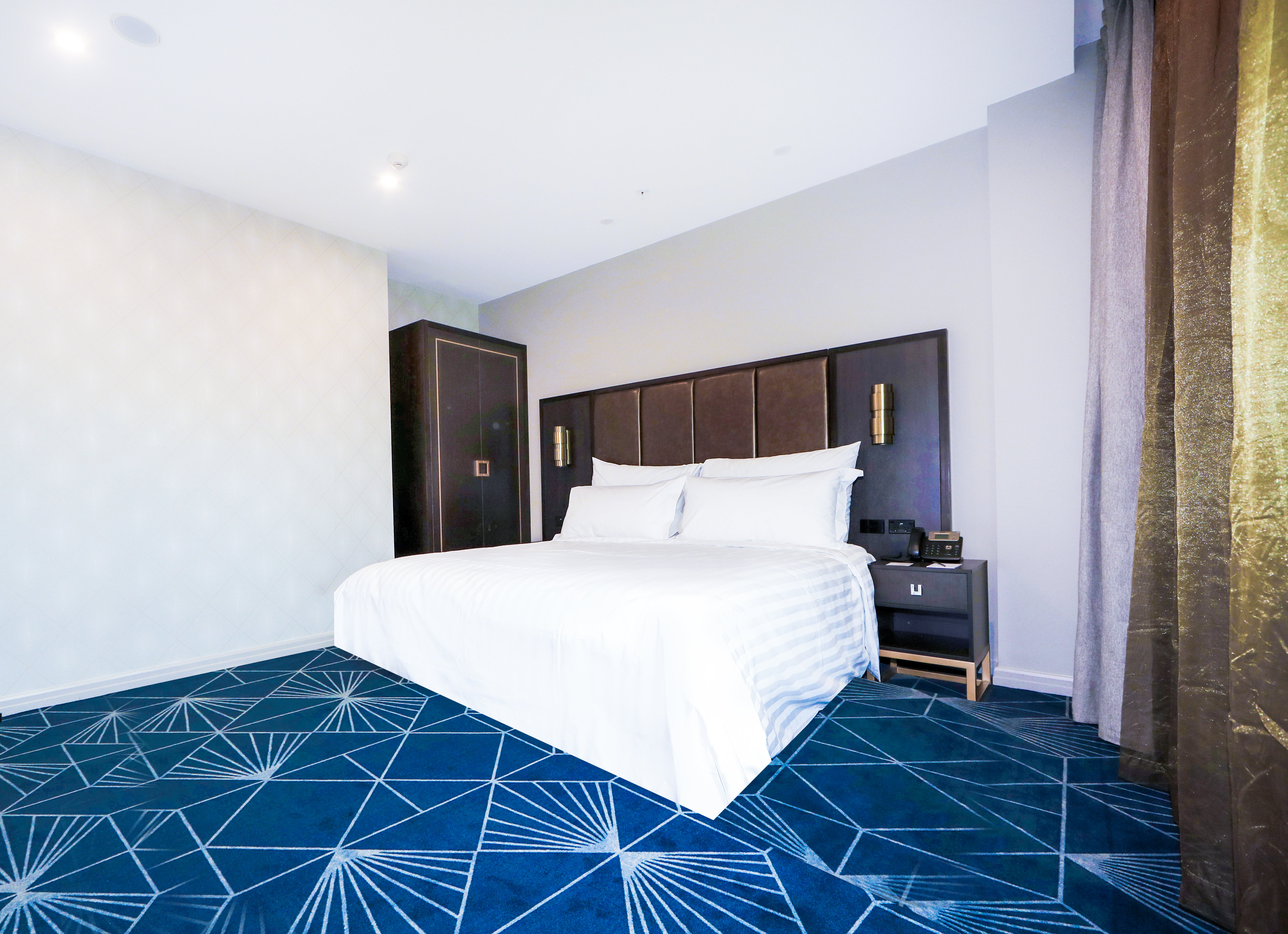 Swiss-Belhotel Napier-guestroom-Swiss Super Suite One Bedroom Bedroom.jpg