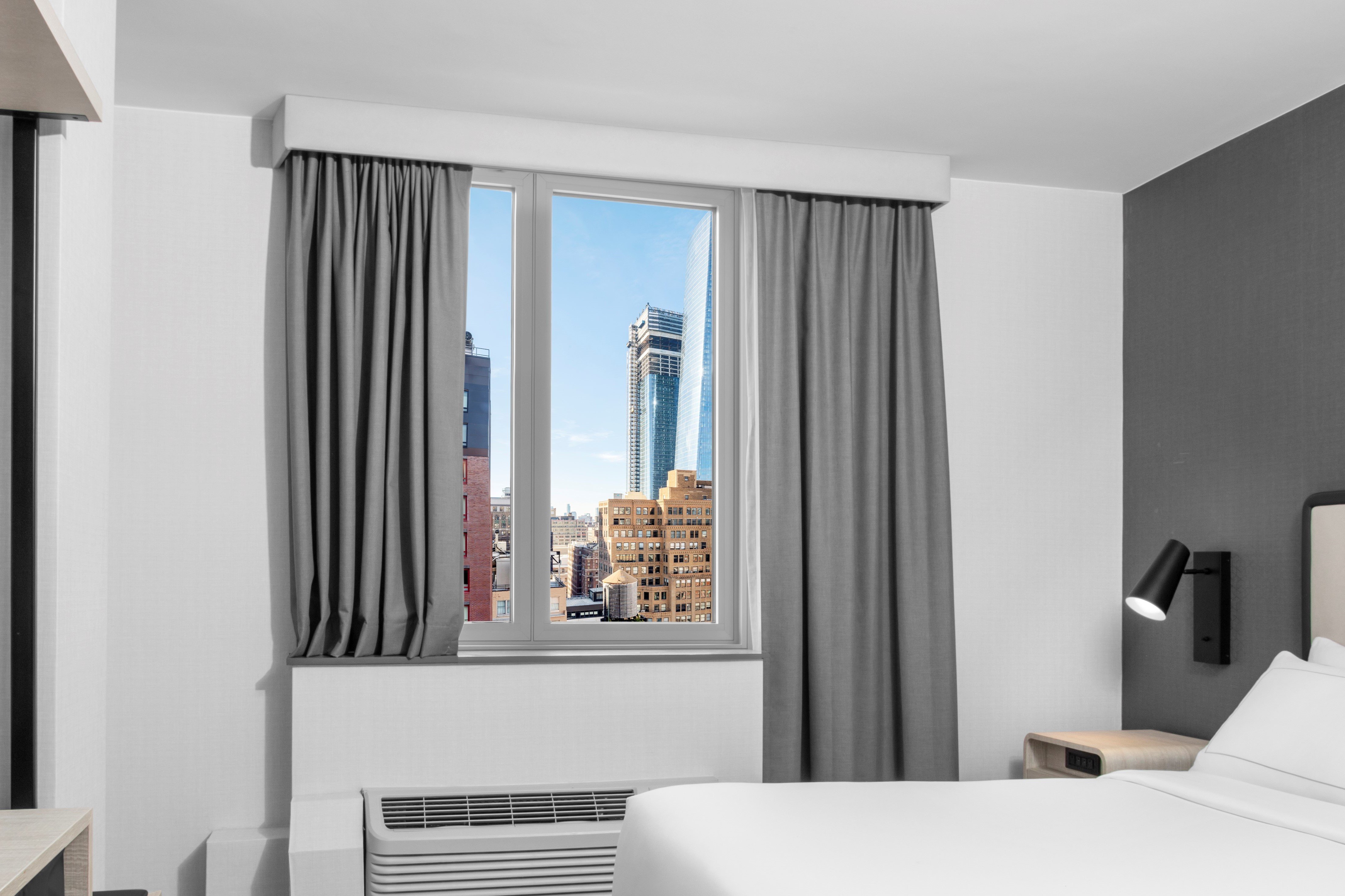 Premium guest rooms offer views of the Manhattan skyline.