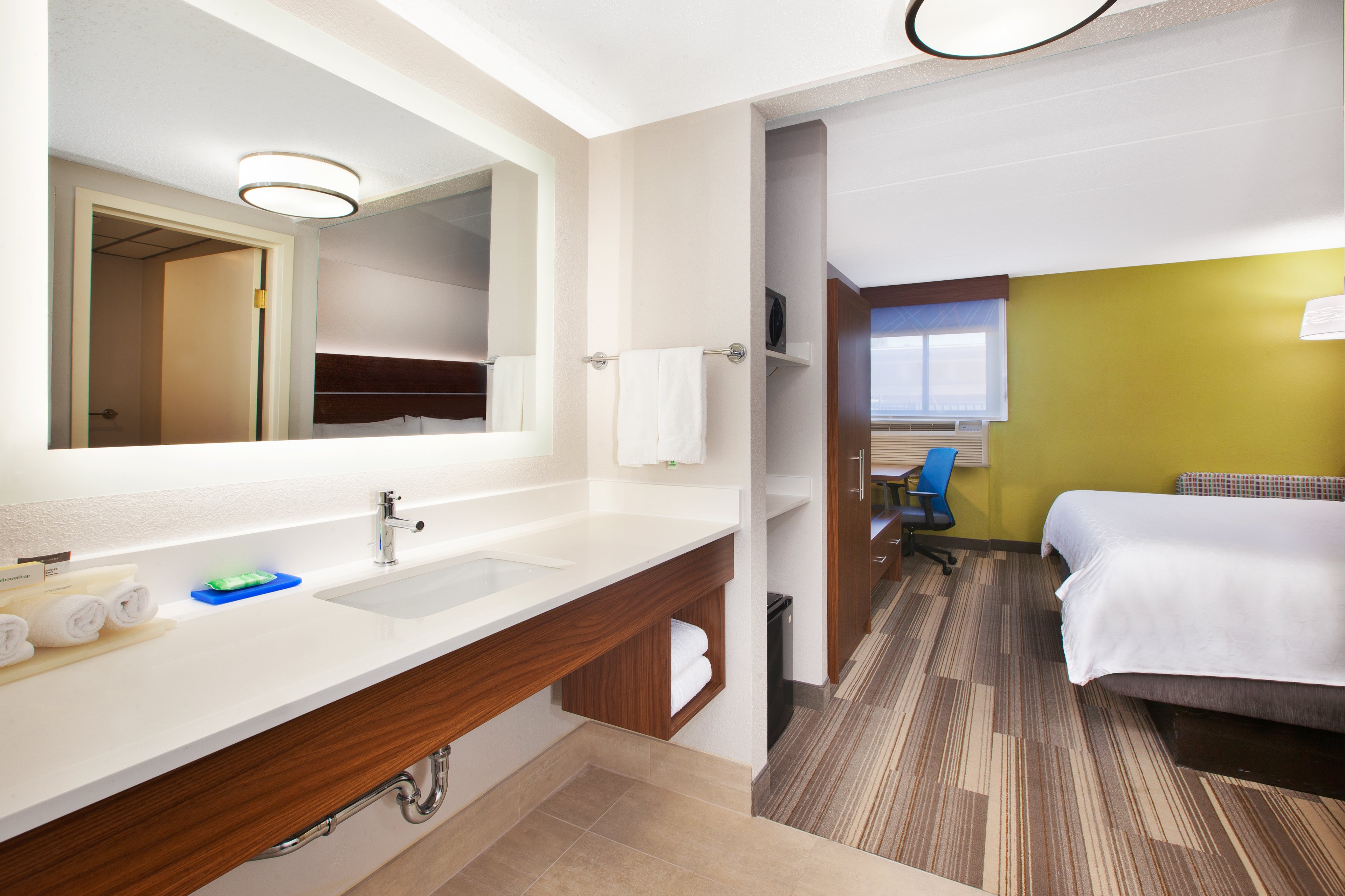 Enjoy the comfort of our King Bed with a spacious bathroom.