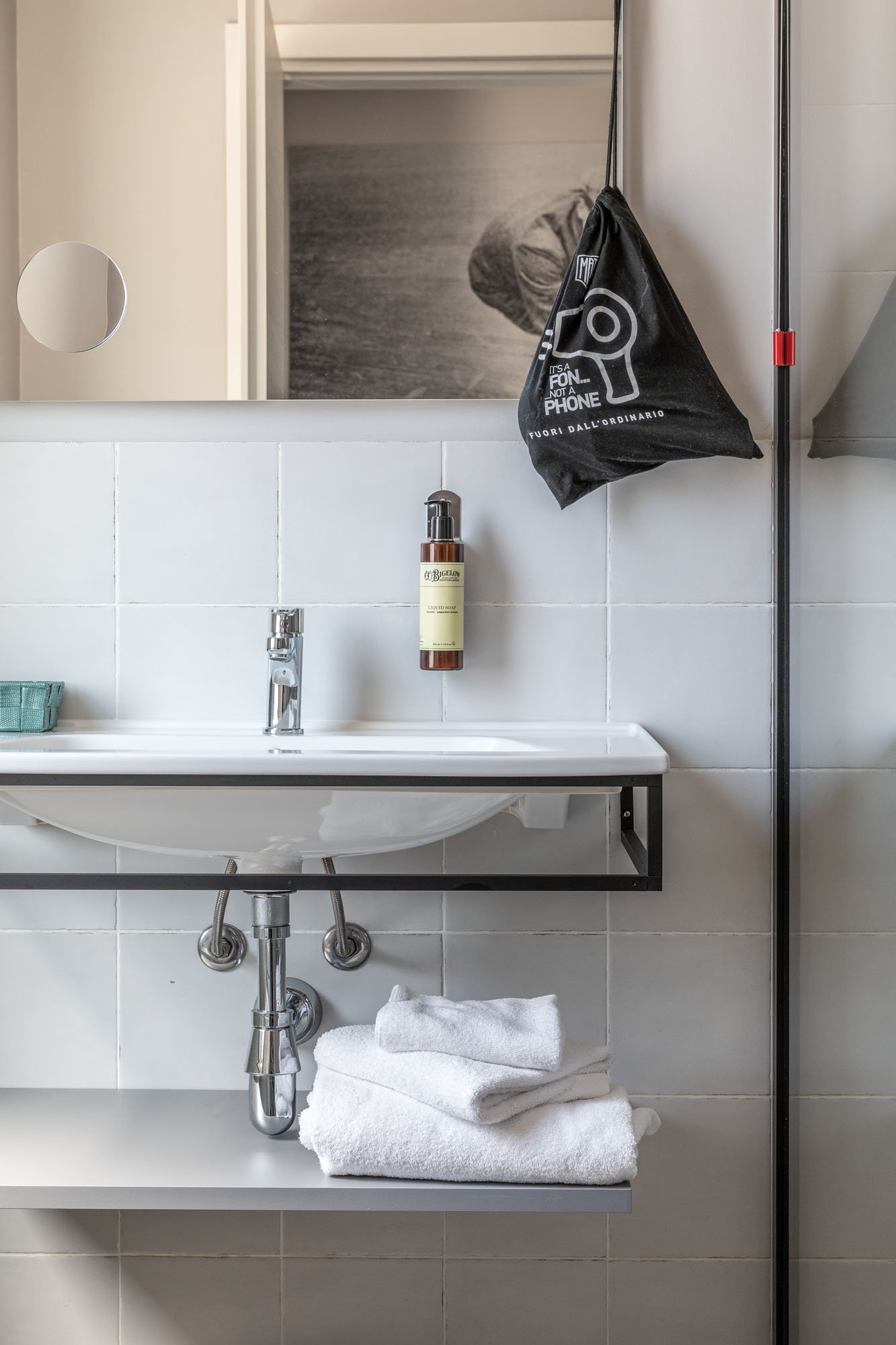 HOTEL MATHIS-guestroom-IN BATHROOM.jpg