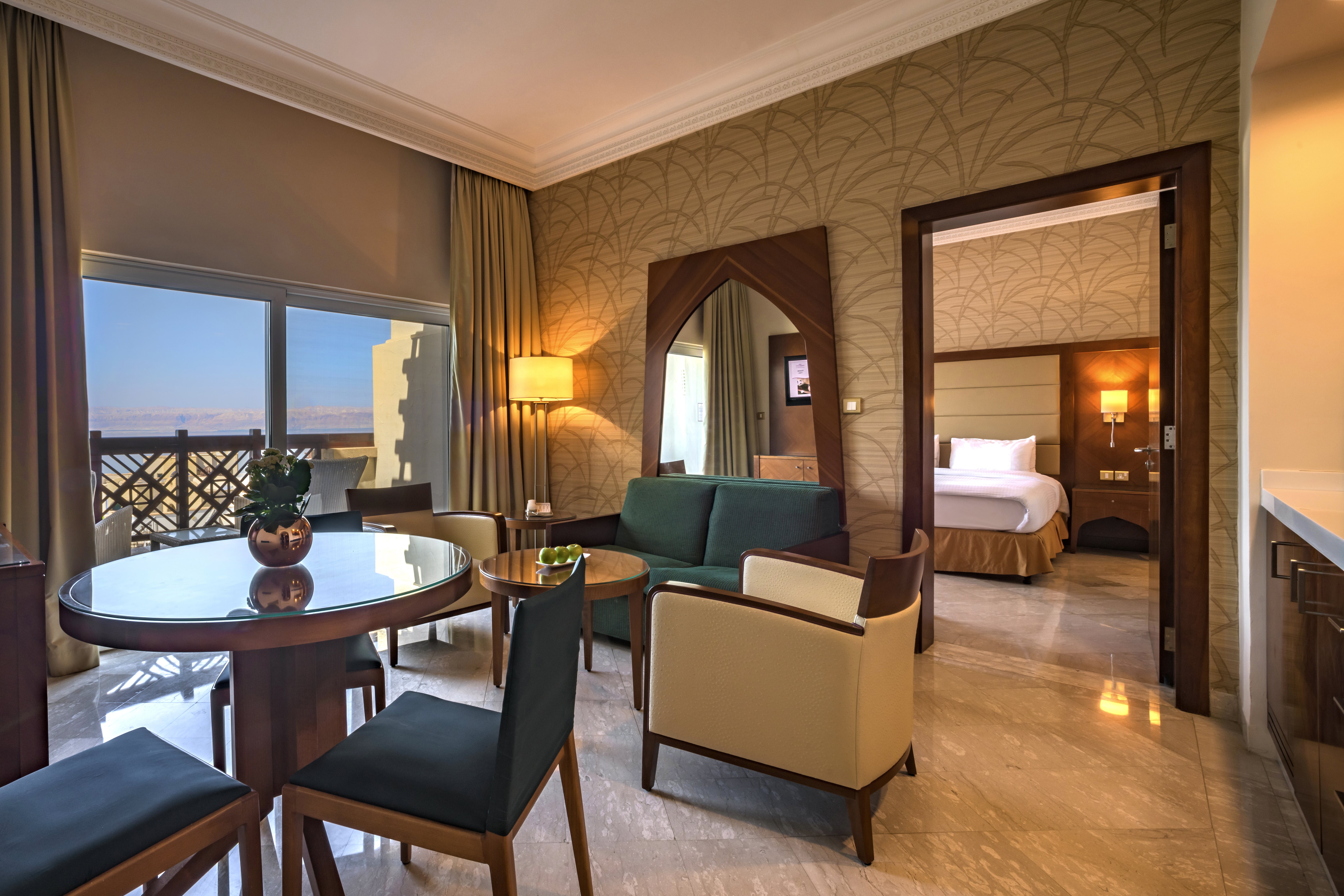 CROWNE PLAZA DEAD SEA JORDAN BY IHG-guestroom-luxury suite with a balcony overlooking to pool /Sea view.jpg