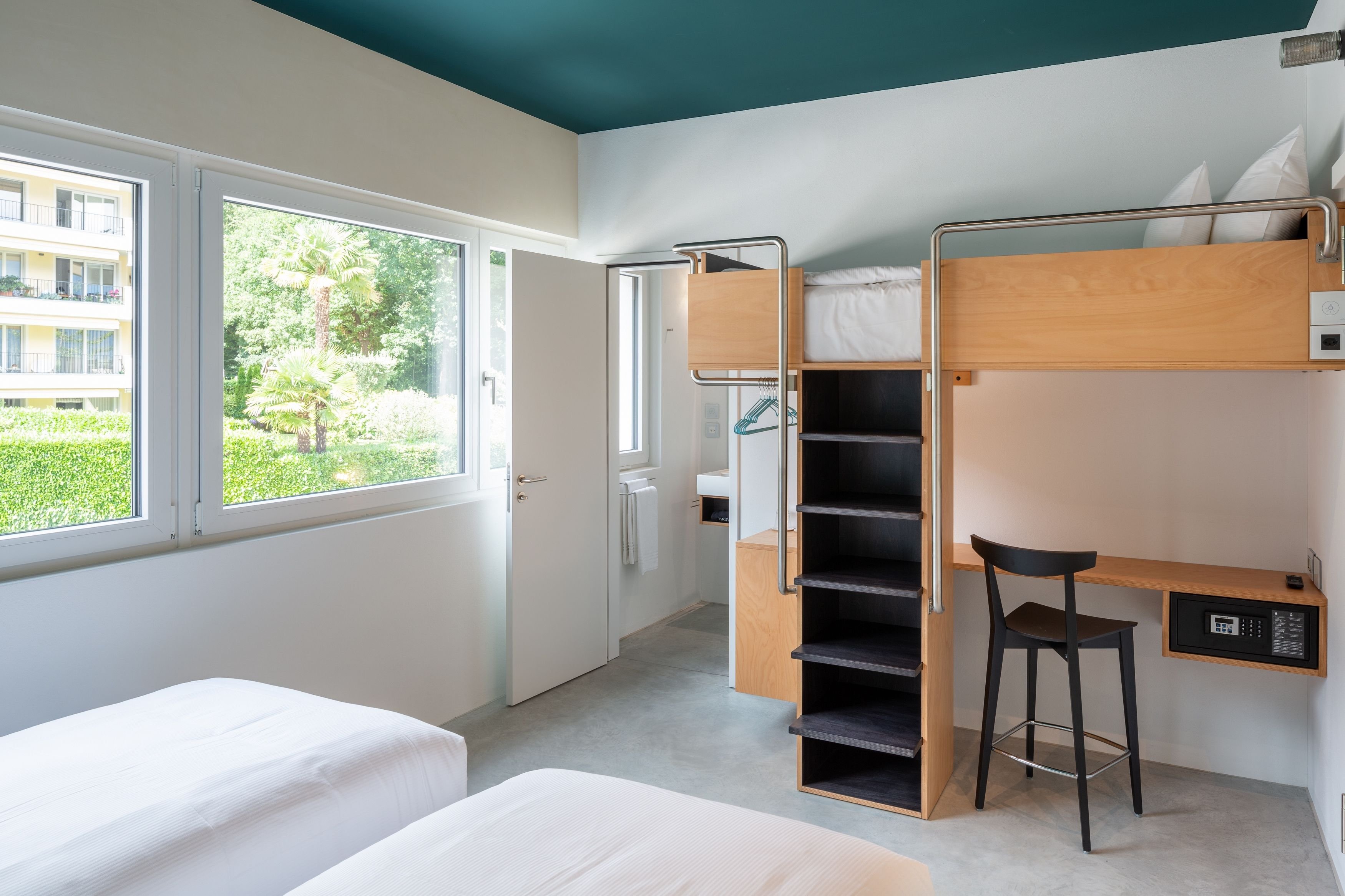 RIVA ROOMS AND STUDIO-guestroom-Family room.jpg