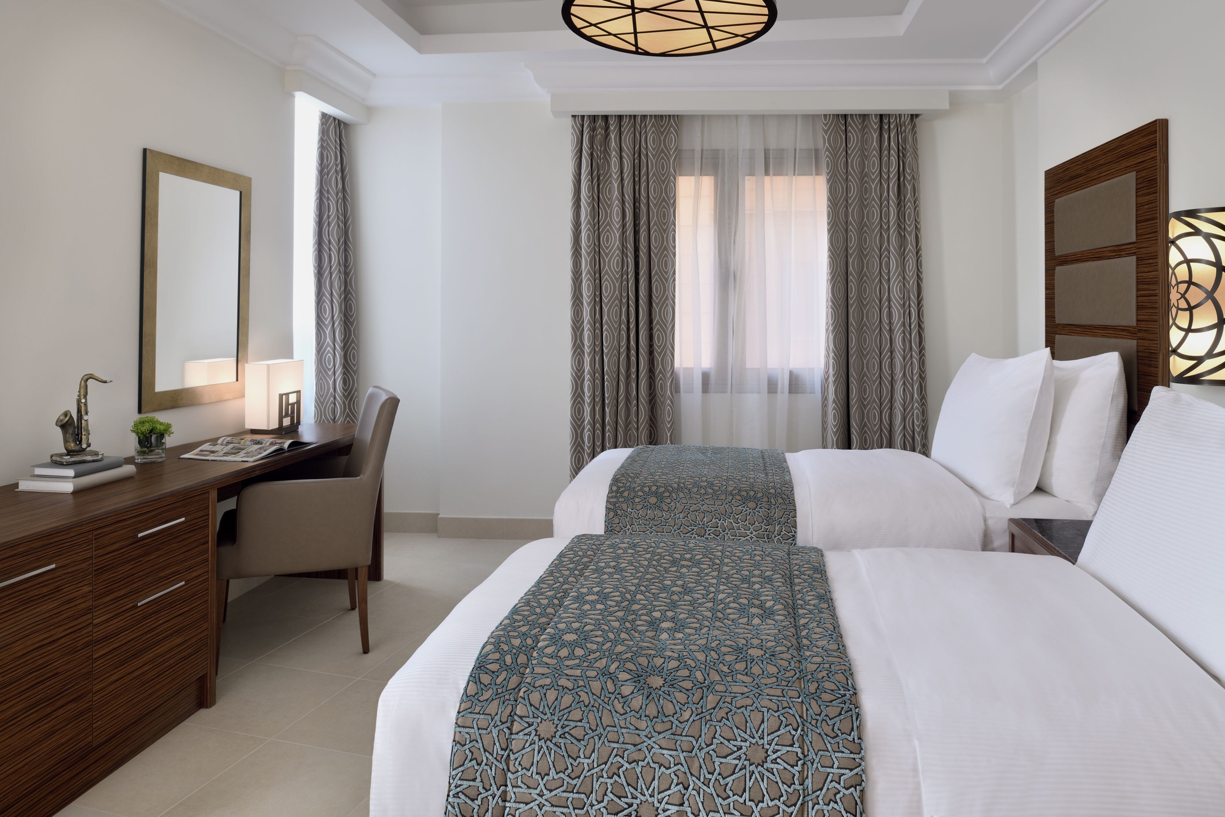 Marriott Executive Apartments Al Khobar-guestroom-Twin Bed.jpg