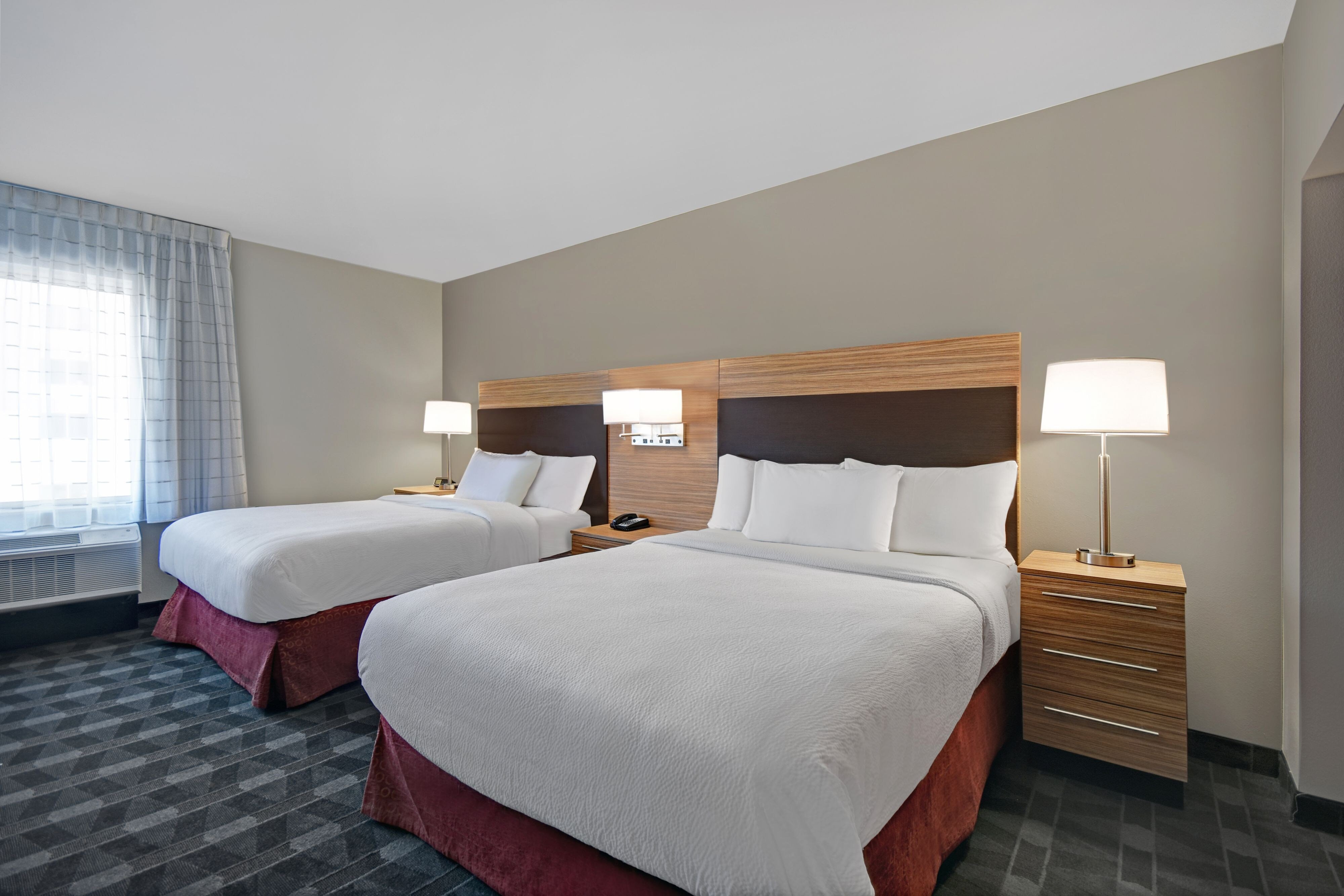 TownePlace Suites by Marriott Grand Rapids Wyoming-guestroom-Bedroom.jpg