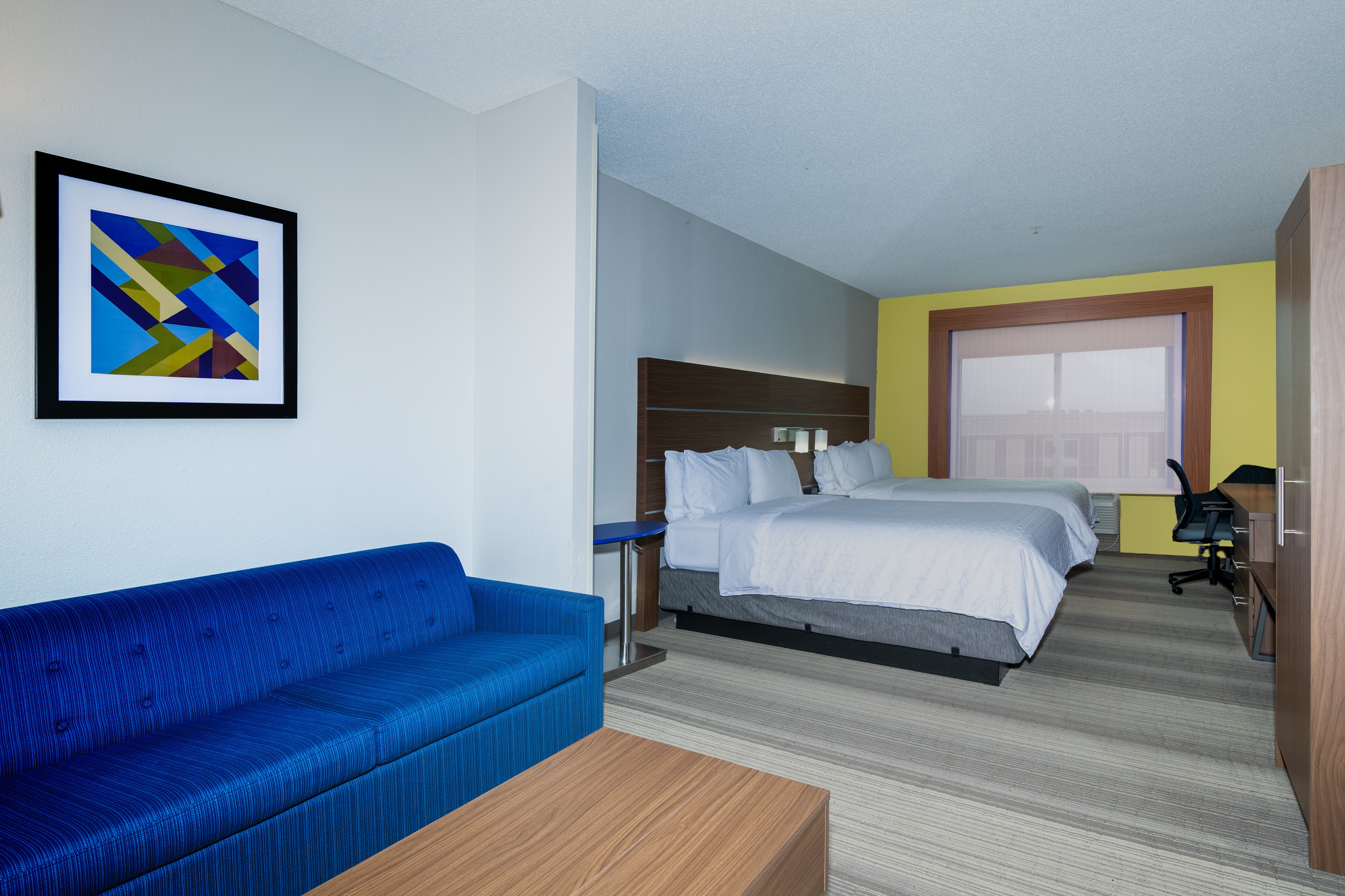 HOLIDAY INN EXP STES WOODBRIDG BY I-guestroom-Double Queen Suite.jpg