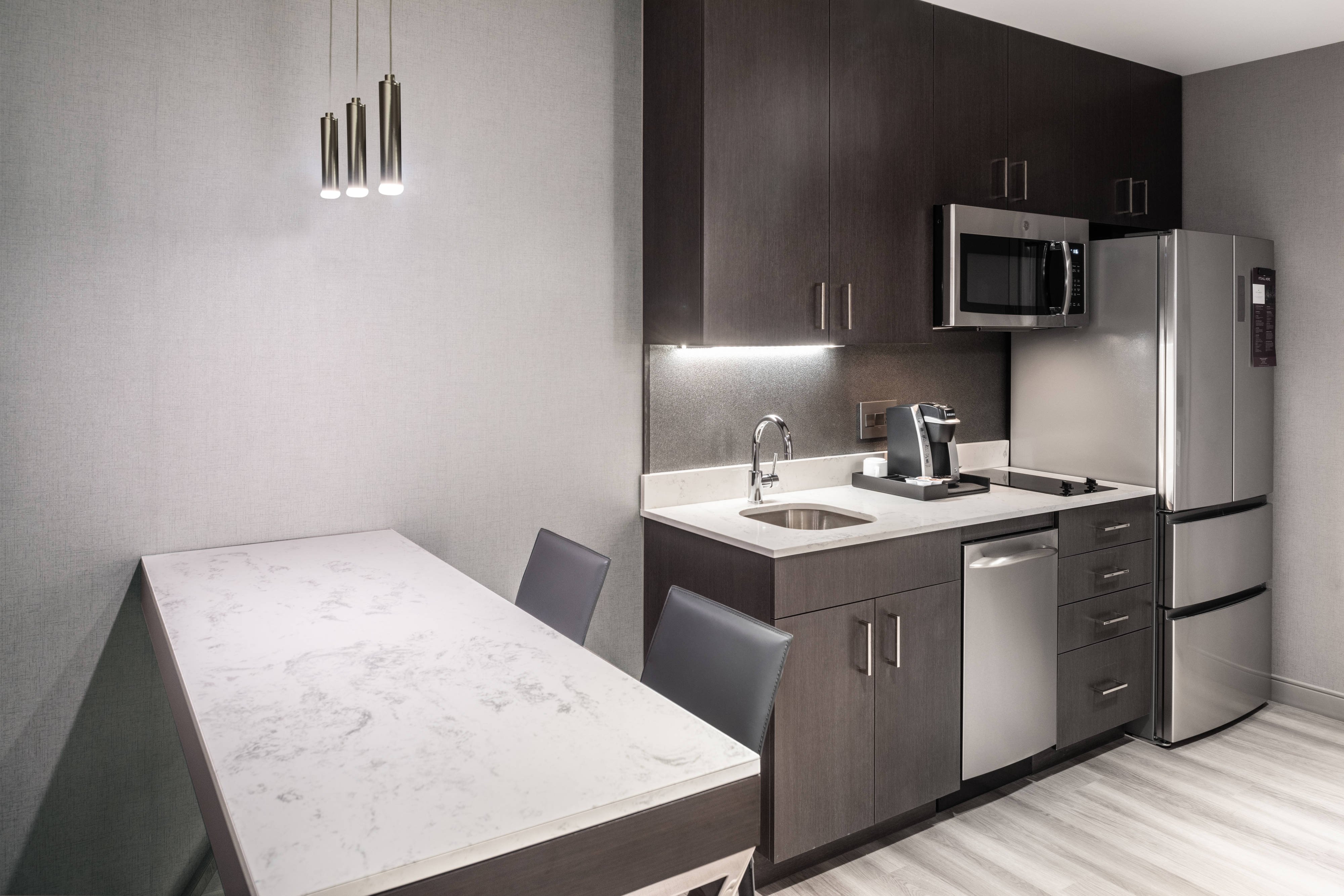 Residence Inn by Marriott Boston Waltham-guestroom-Guest Room Kitchen.jpg