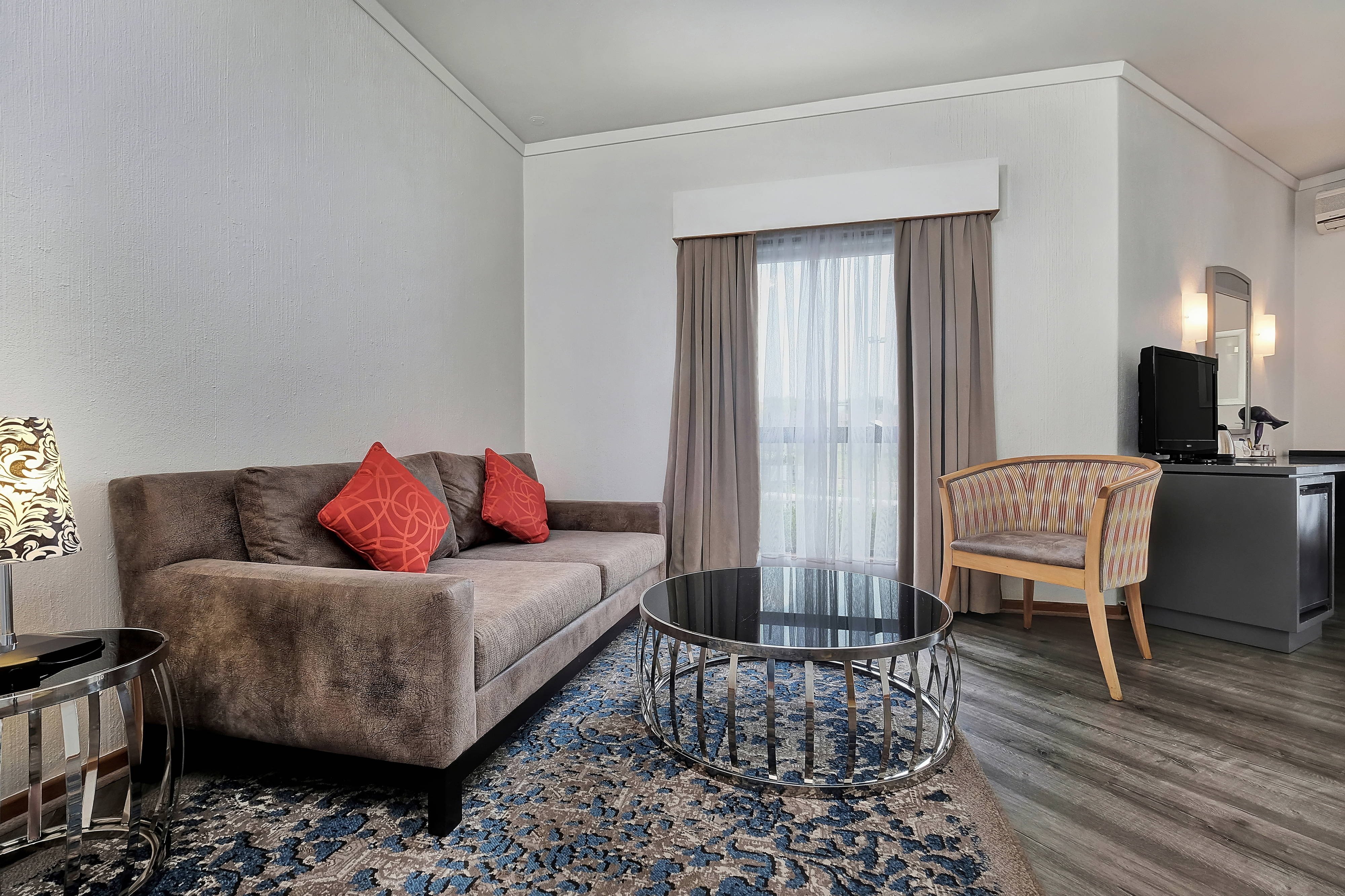 Protea Hotel by Marriott Midrand-guestroom-Executive Queen Guest Room - Living Area.jpg