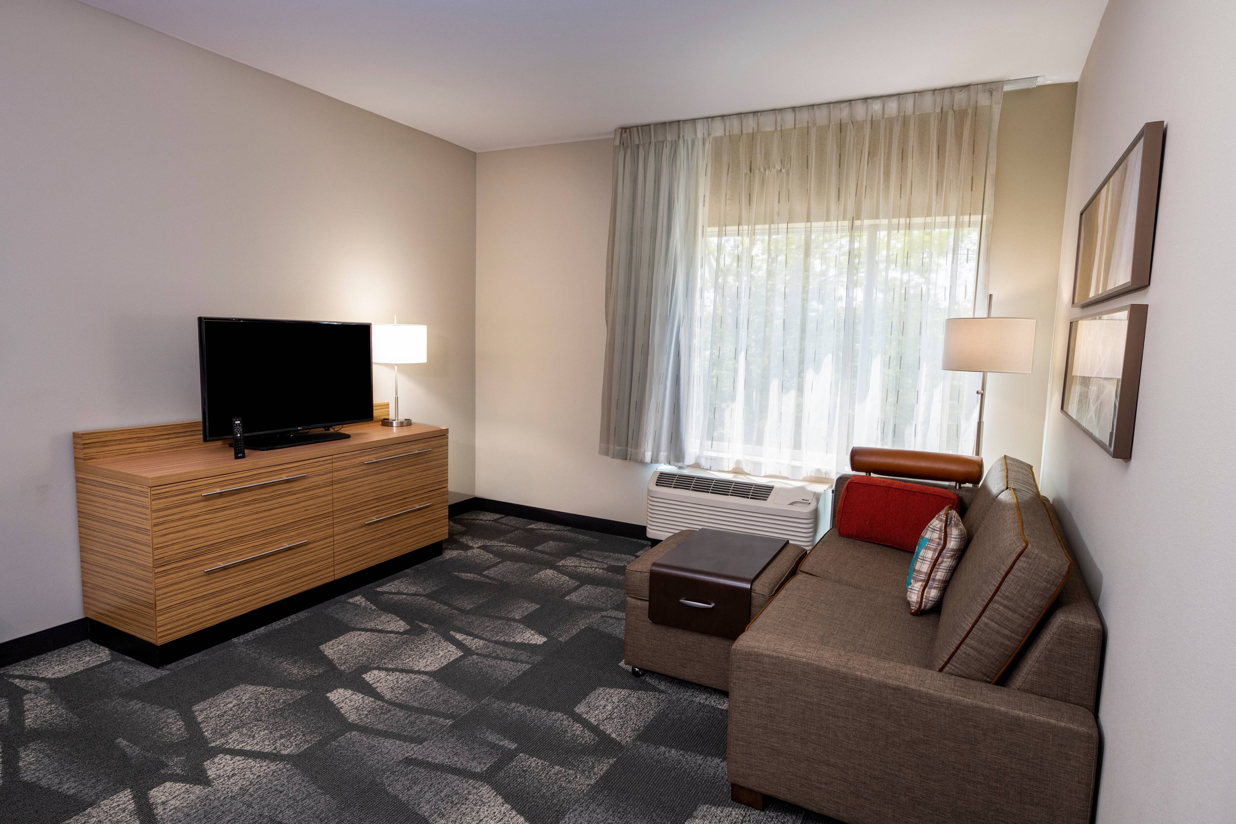 TownePlace Suites by Marriott Fort Mill at Carowinds Blvd-guestroom-One-Bedroom Queen Suite - Living Area.jpg