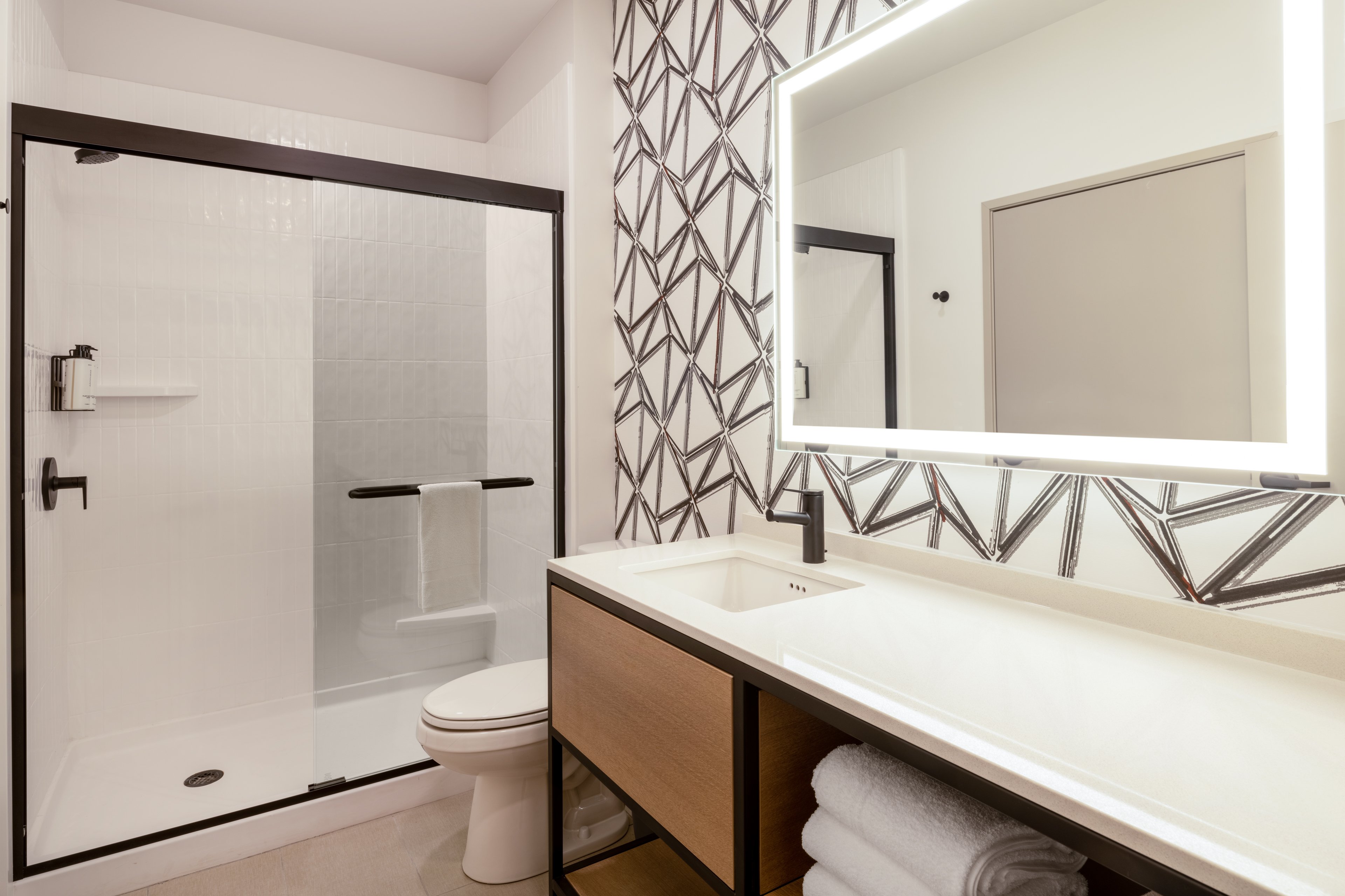 Guest bathrooms feature modern design and amenities