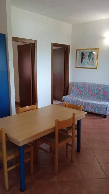 CAPO RIZZUTO BEACH RESIDENCE-guestroom-In Room Living Room.jpg