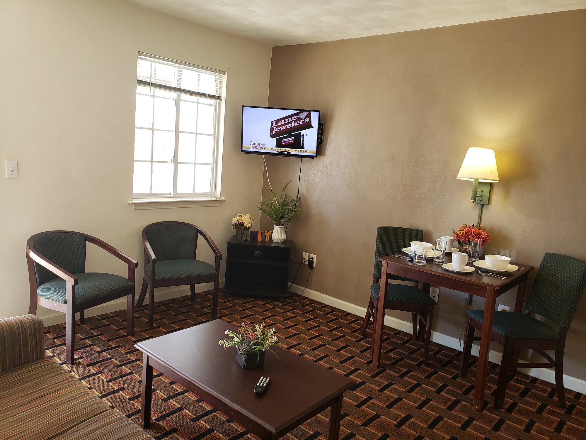 Affordable Suites of America --guestroom-Standard Queen Suite.jpg