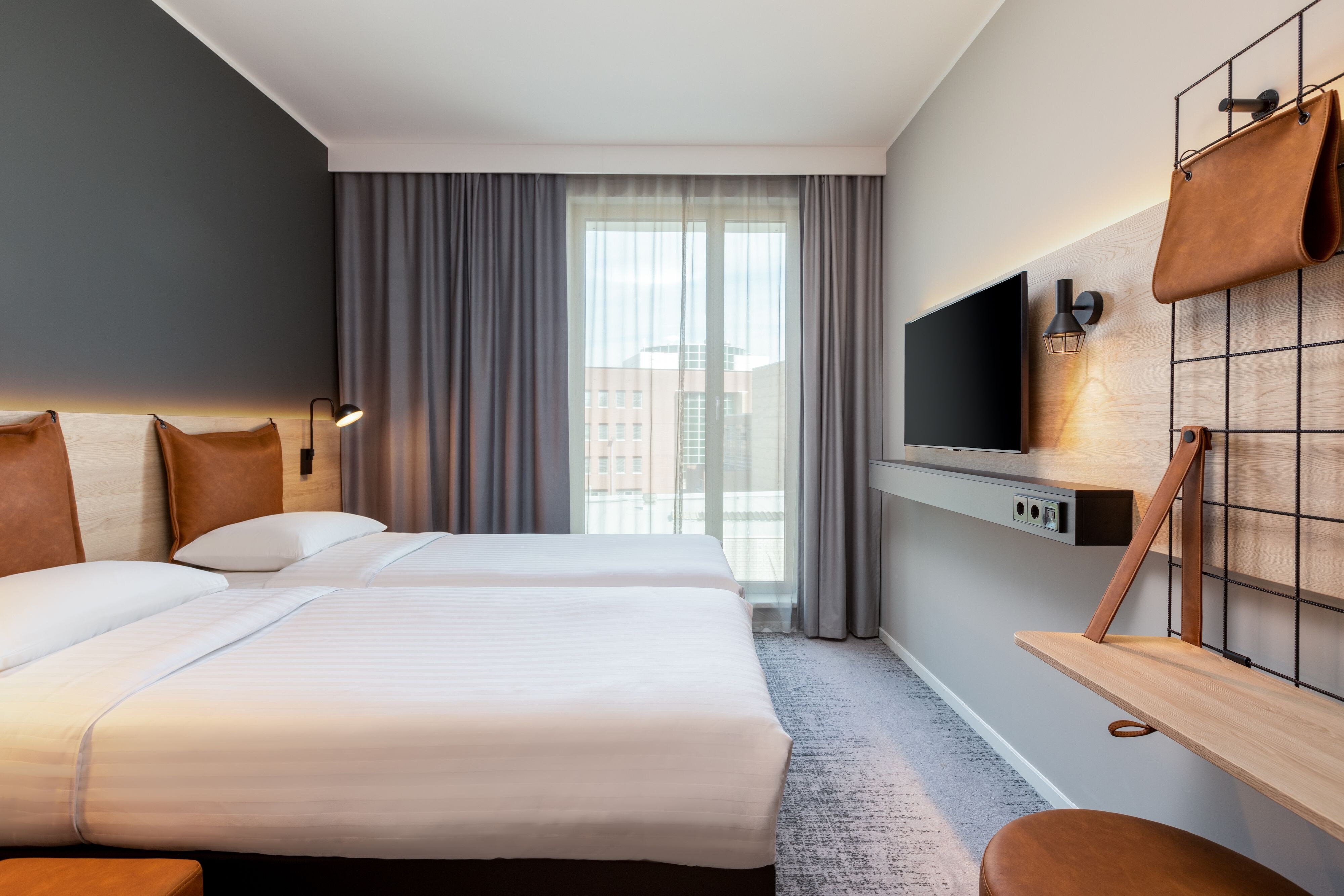 Moxy Dortmund City-guestroom-Twin Guestroom.jpg