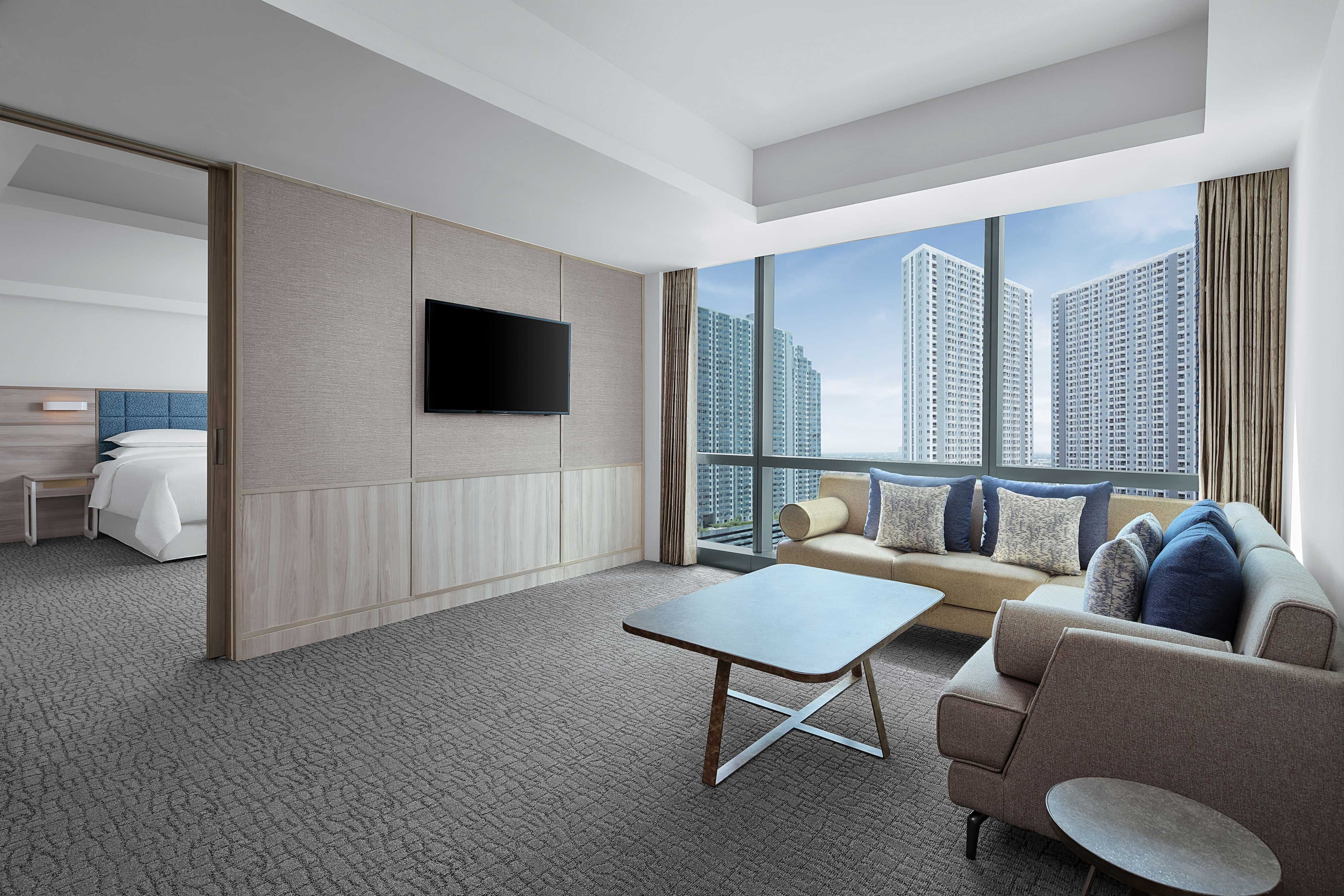 Four Points by Sheraton Surabaya Pakuwon Indah-guestroom-Premium Suite - Living Room.jpg