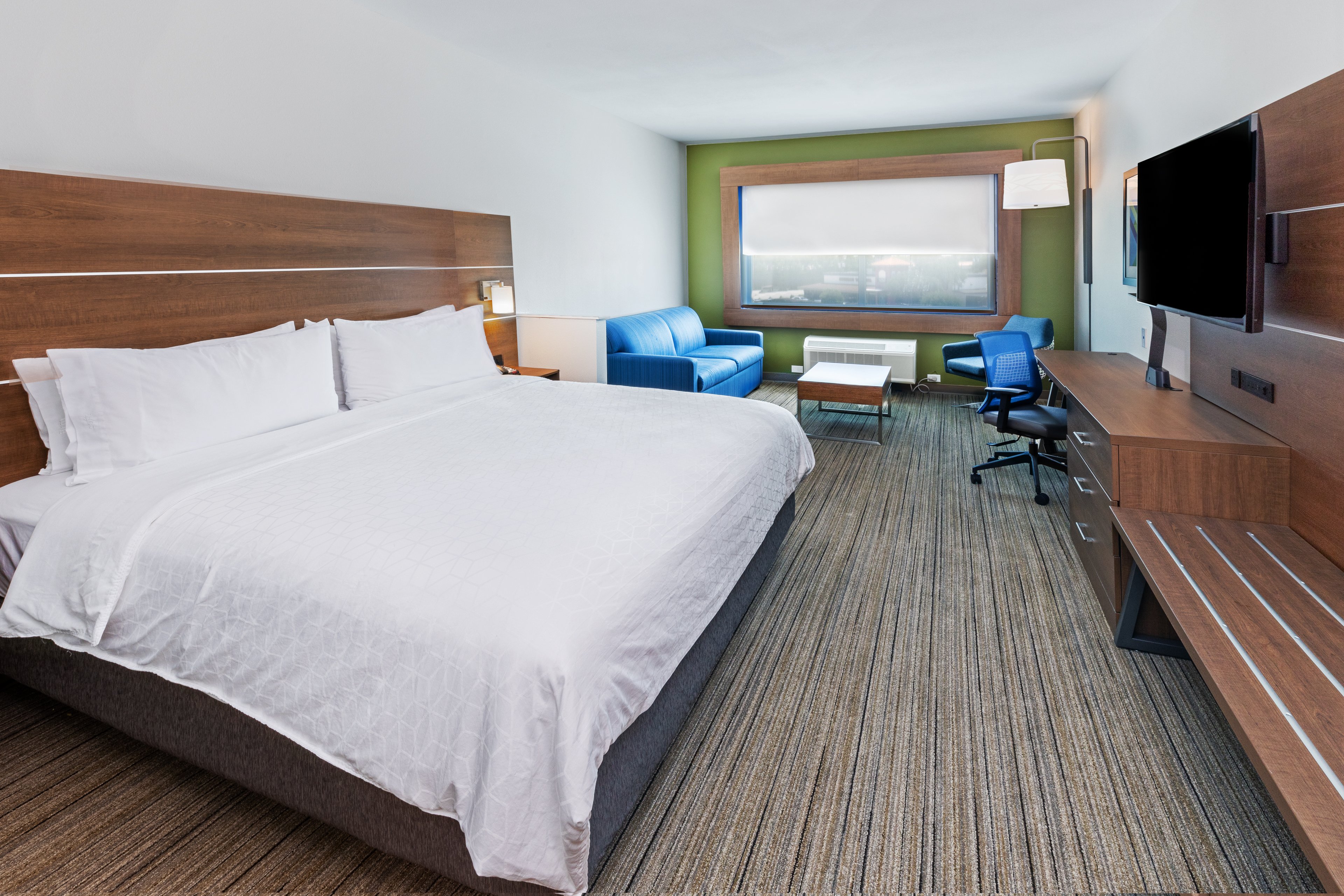 HOLIDAY INN EXP STES STAFFORD-guestroom-Experience ultimate comfort in our luxurious King Suite .jpg