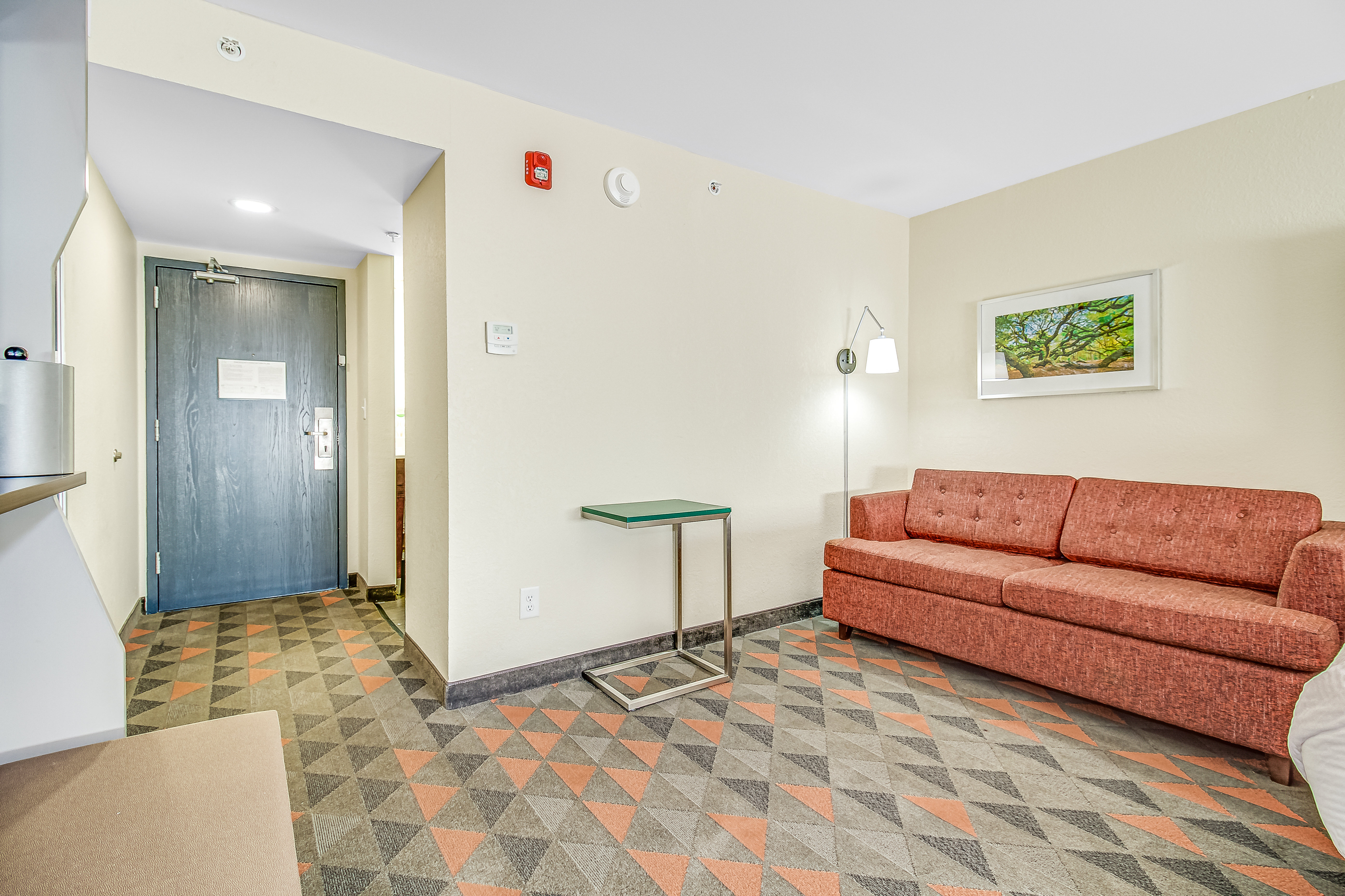 HOLIDAY INN NORTHWEST BY IHG-guestroom-Stretch out in style: Guest Room with Sofa..jpg